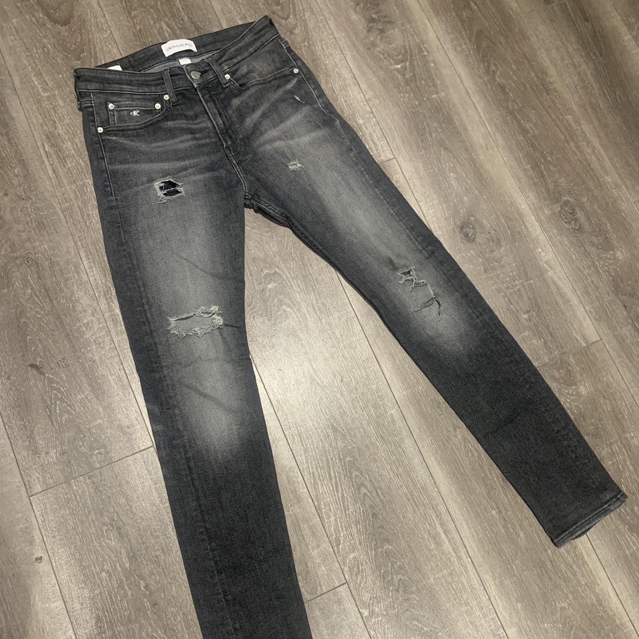 Calvin Klein Ripped Jeans - Depop