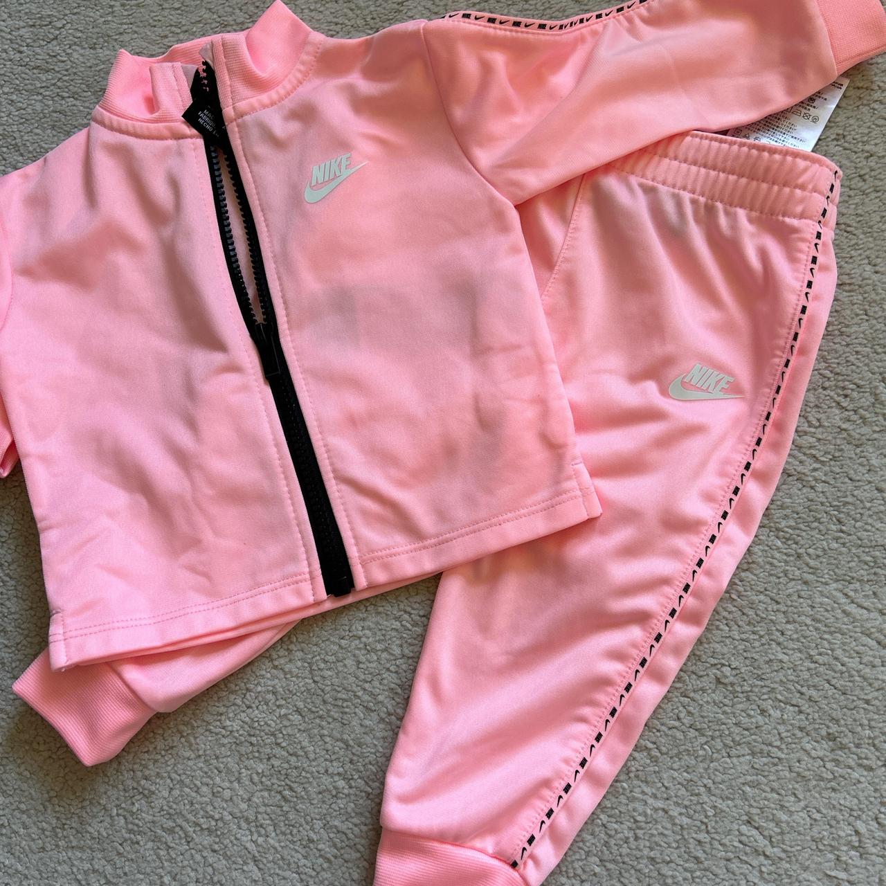 Pink nike suit on sale