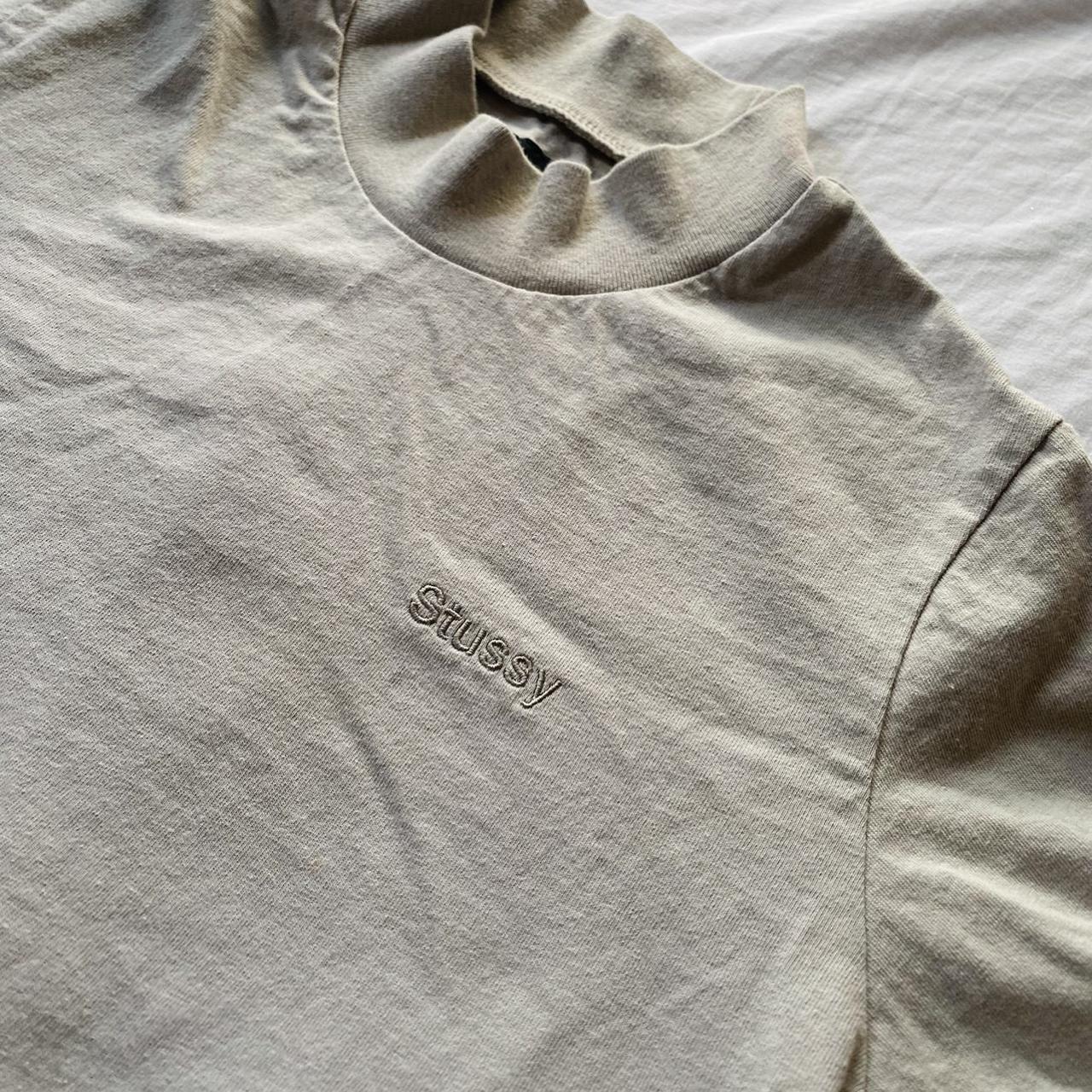 Beige stussy short sleeve high neck t-shirt. Bought... - Depop