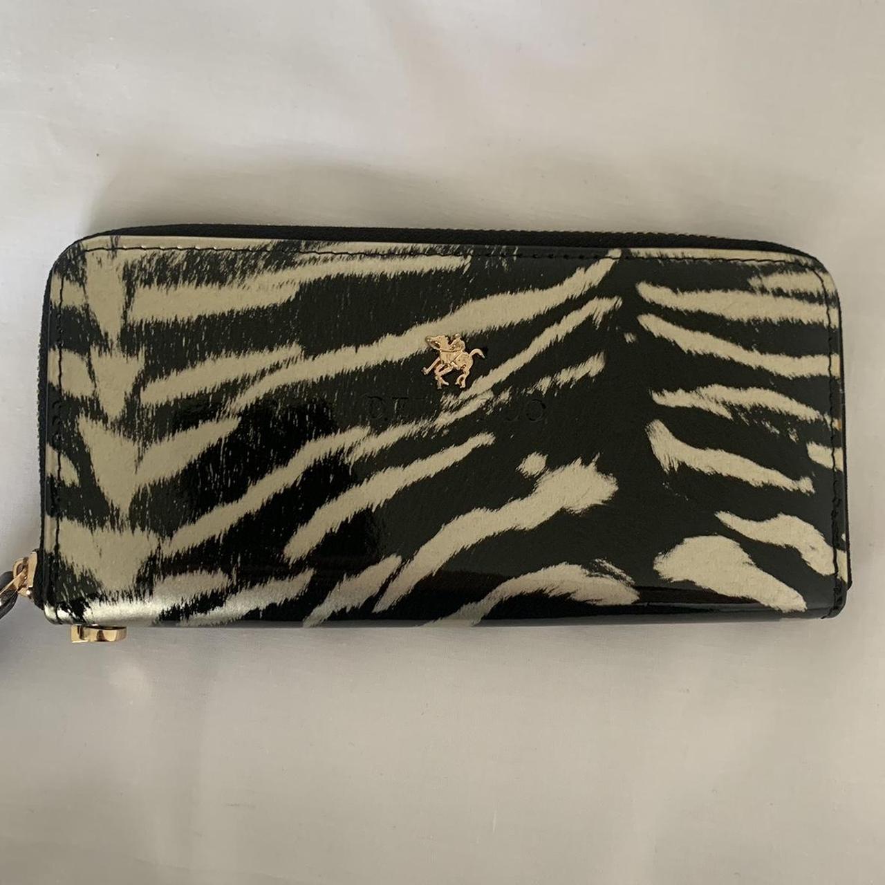 Deli polo zebra print purse new never used with