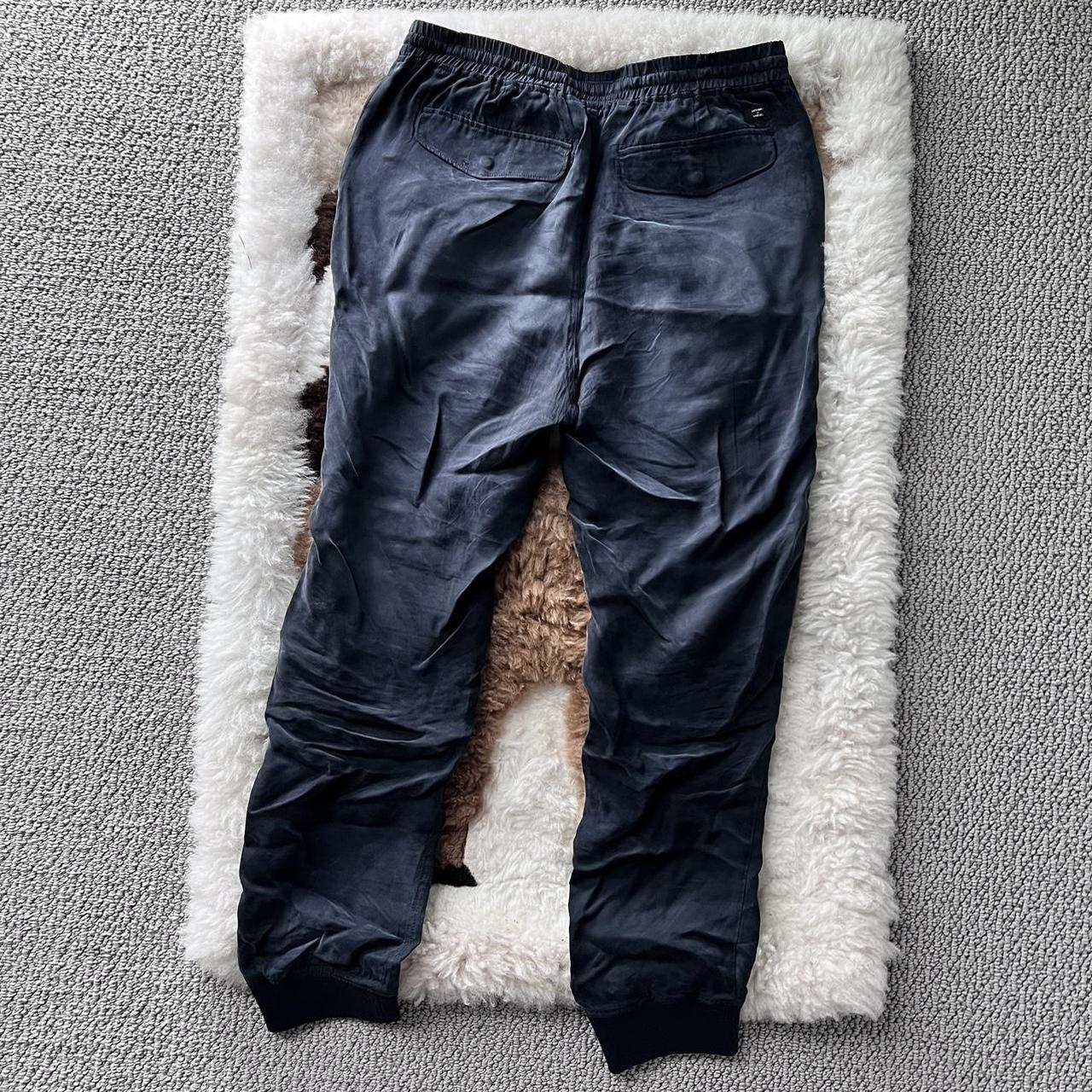 Superdry cuffed joggers with side pockets and back... - Depop