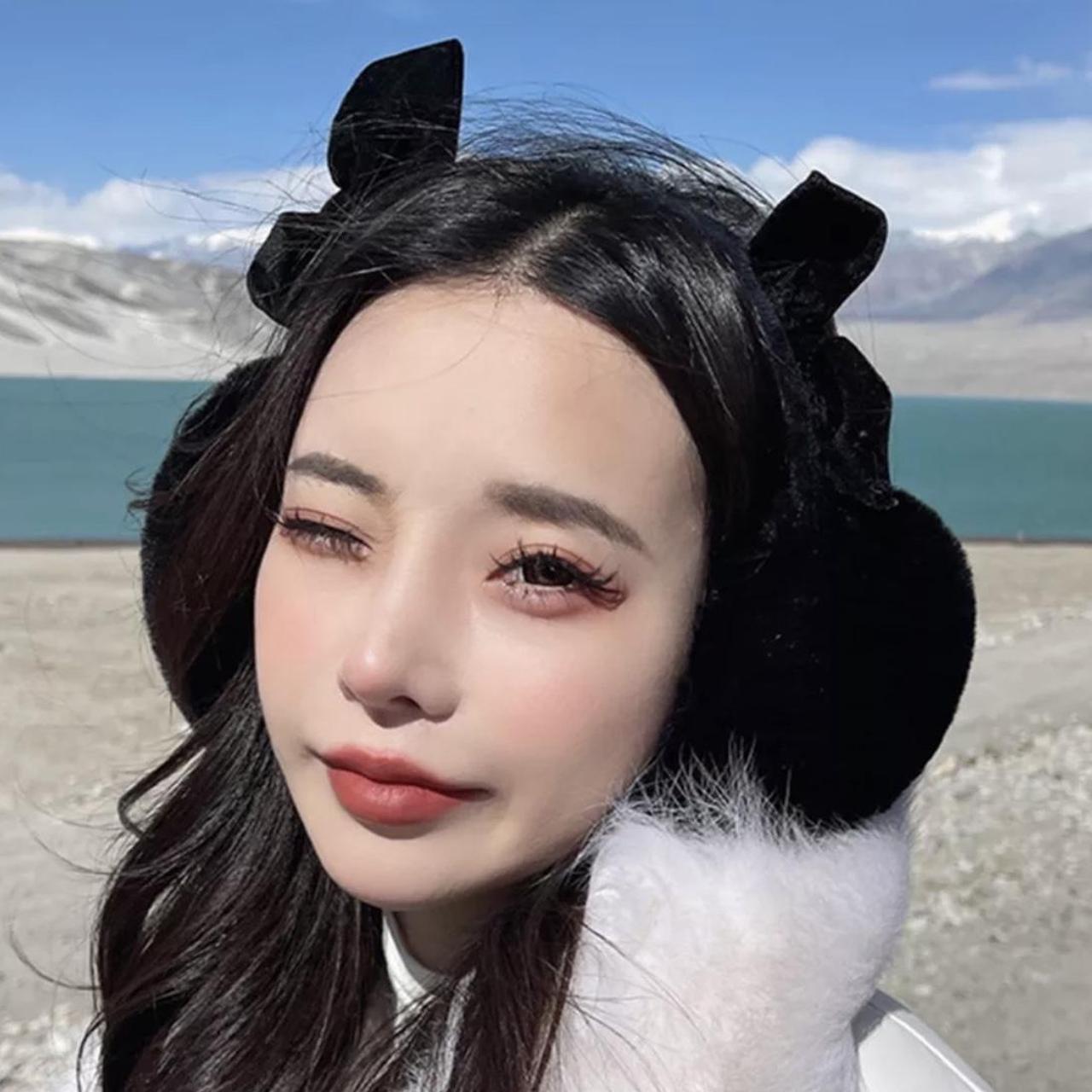 Black Earmuffs with bows very fluffy and big!... Depop