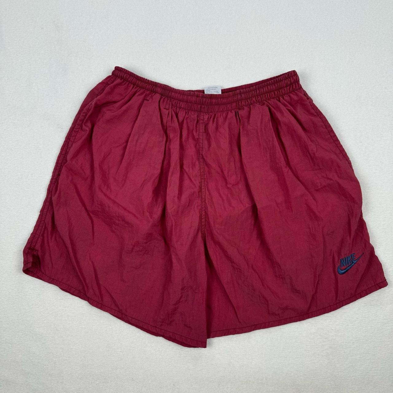 red nike nylon shorts