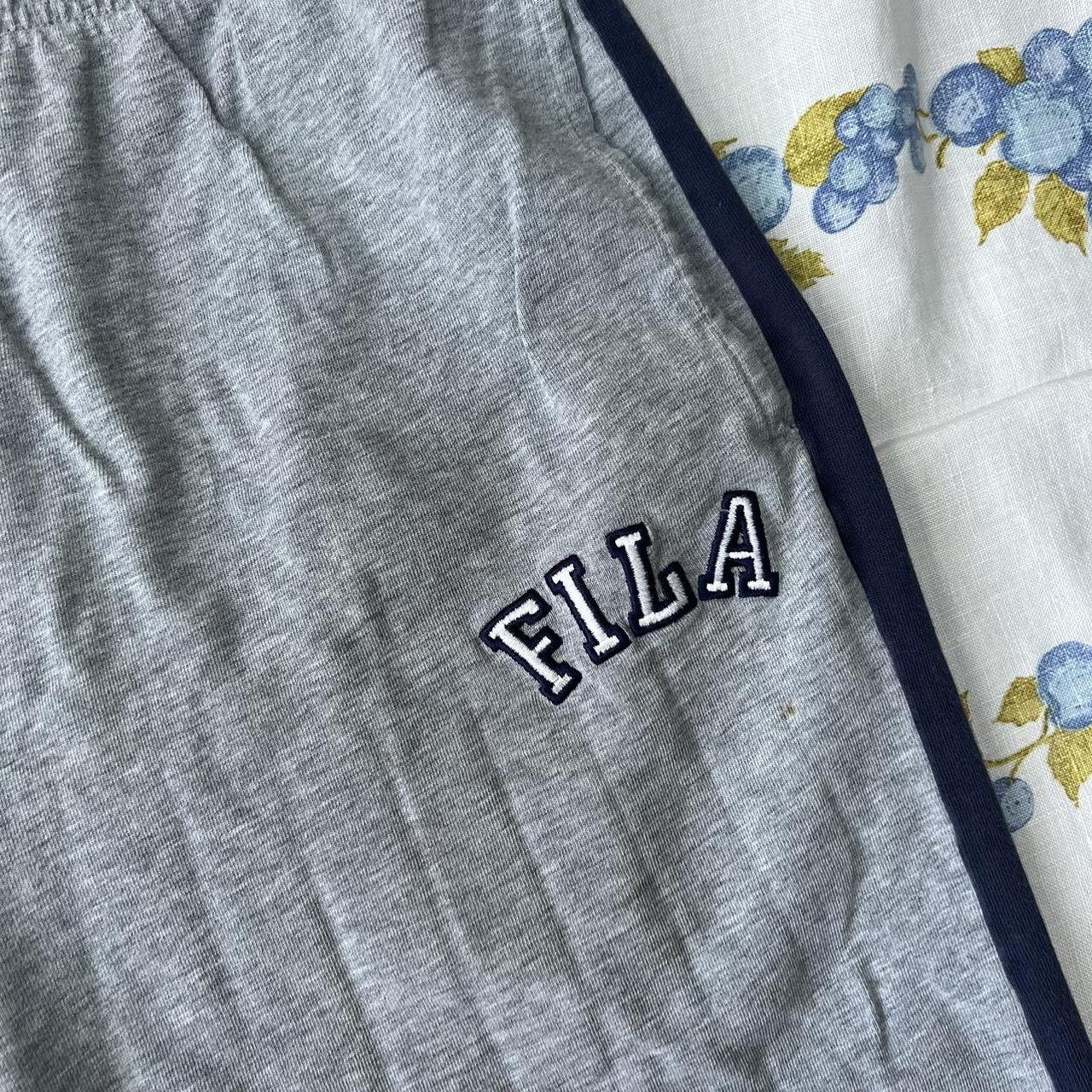 Dark blue/ navy blue fila leggings with embroidered - Depop