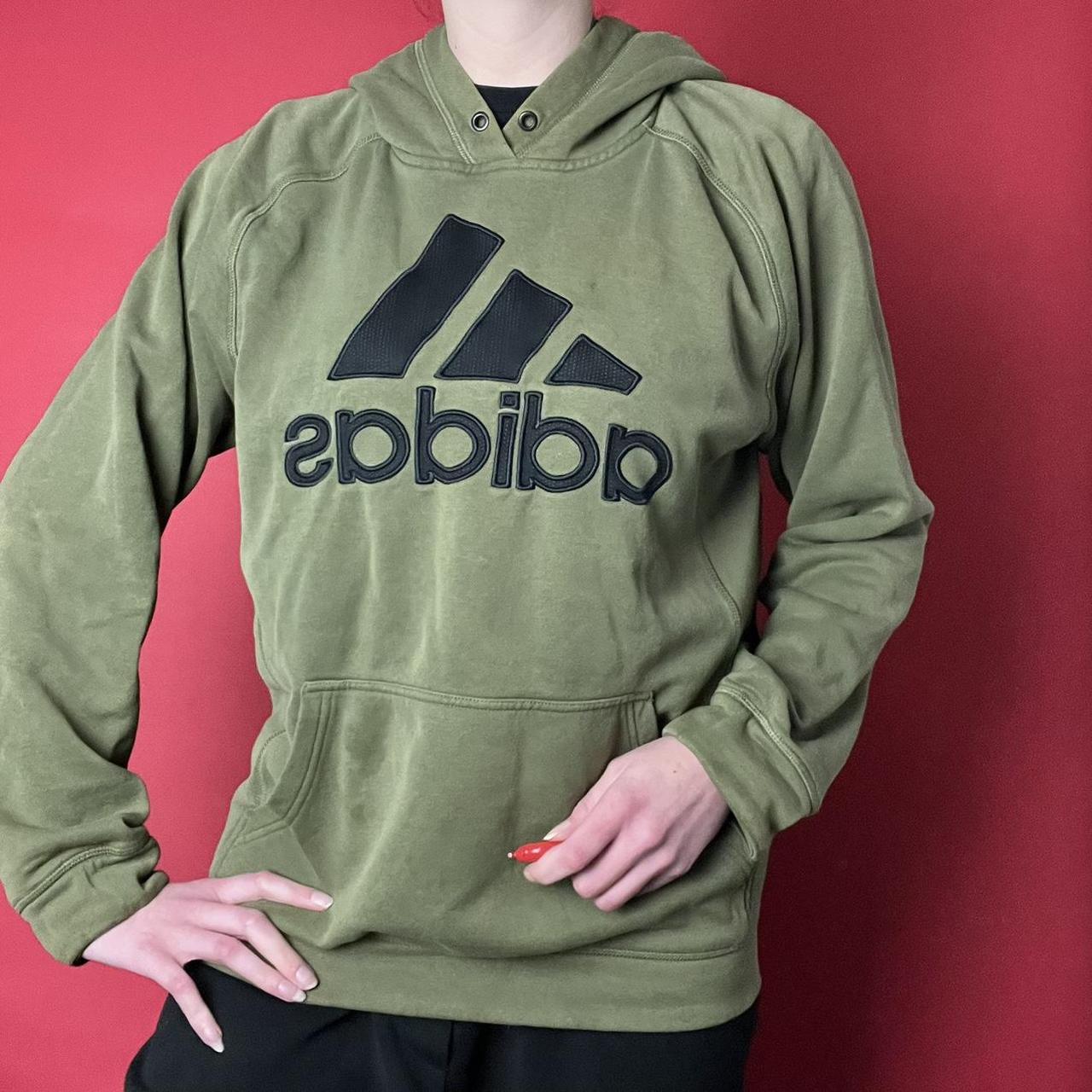 Adidas Army green hoodie with black branding. Depop