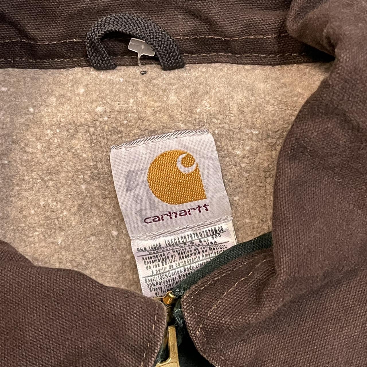 Green carhartt jacket. Vintage so shows signs of... - Depop