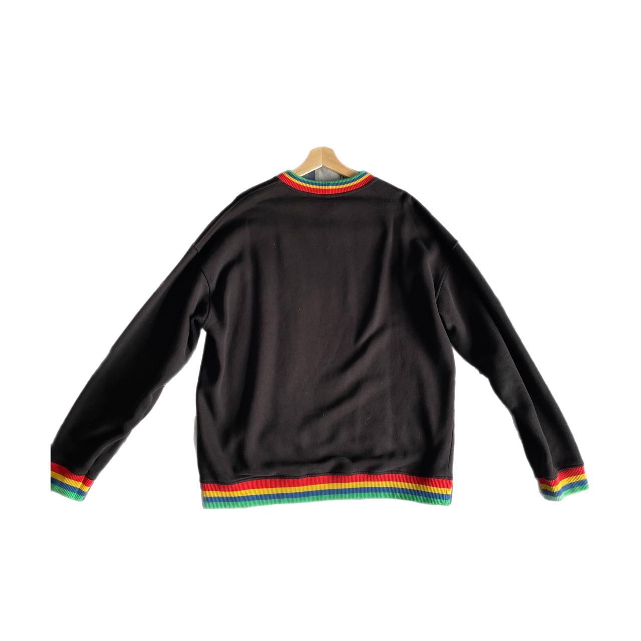 Black Benetton jumper (with the colours of Benetton... - Depop