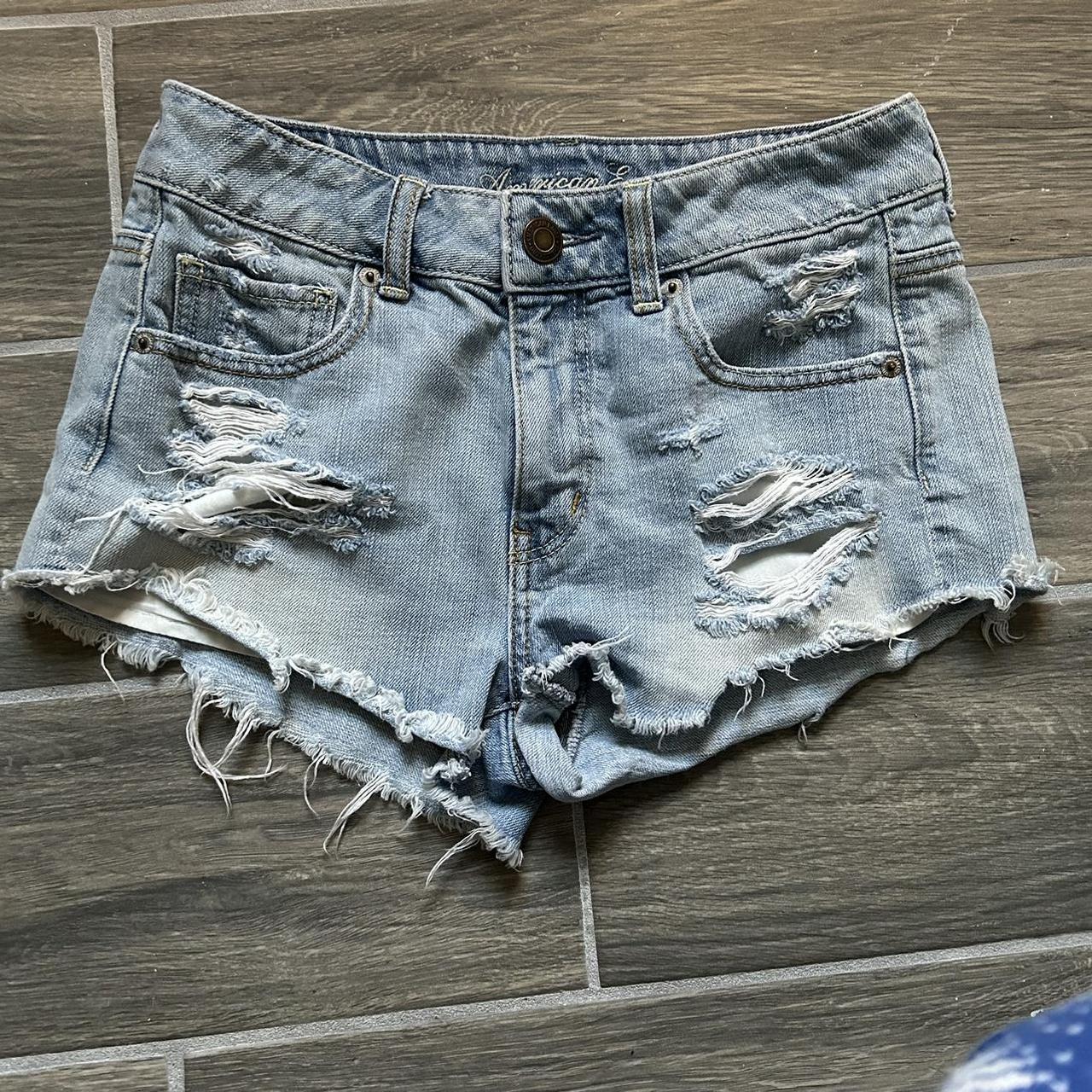 light washed ripped jean shorts by american eagle... - Depop