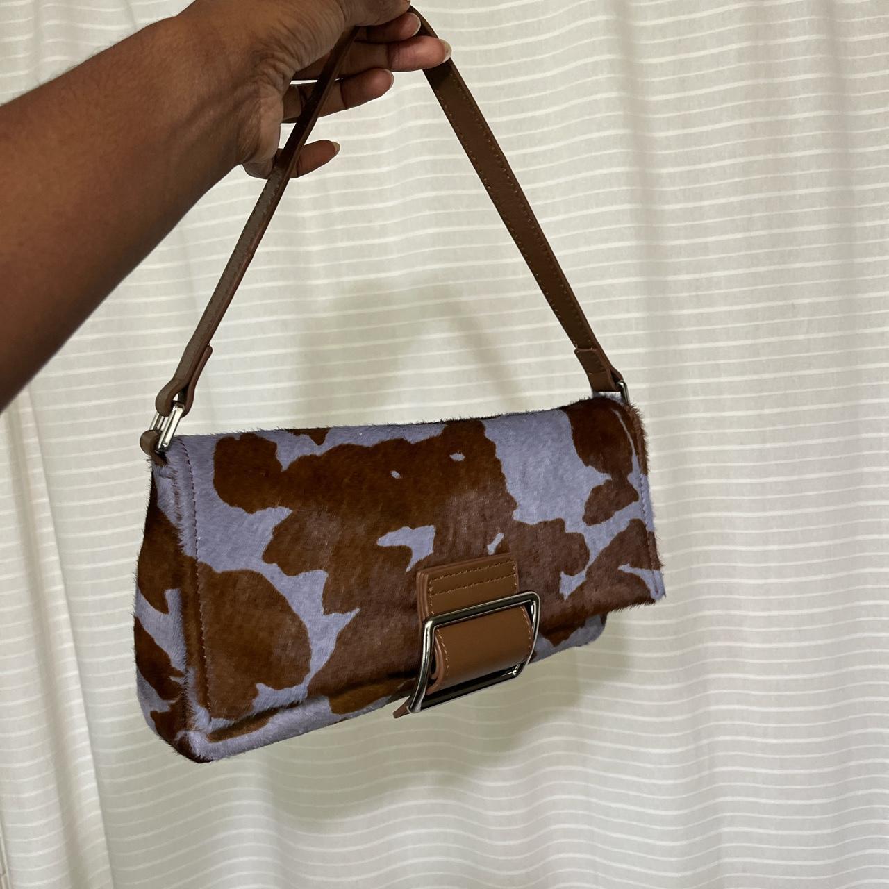 Perfect on doing UO cow print bag. 100% cow hair &... - Depop