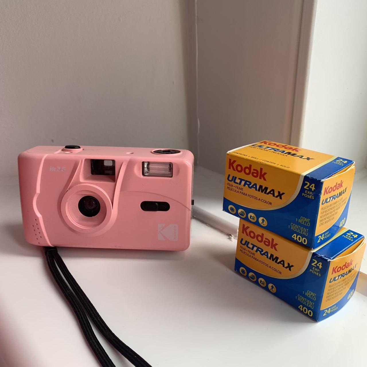 pink kodak 35mm reusable film camera from urban... Depop