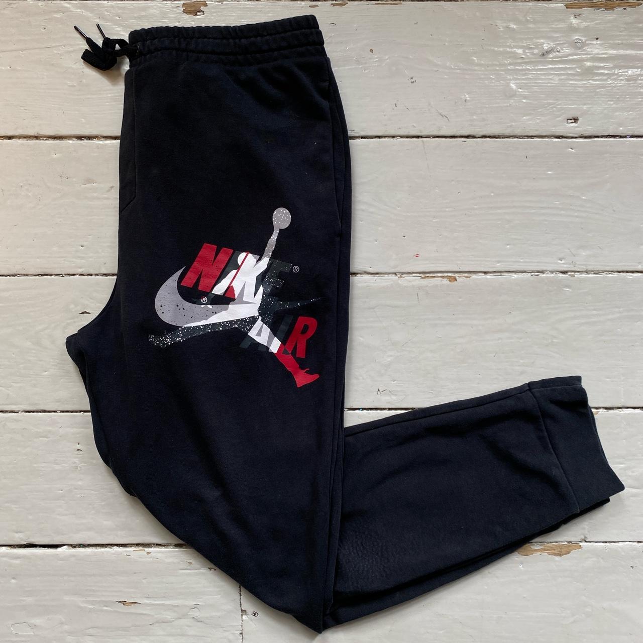 Black and red jordan joggers best sale