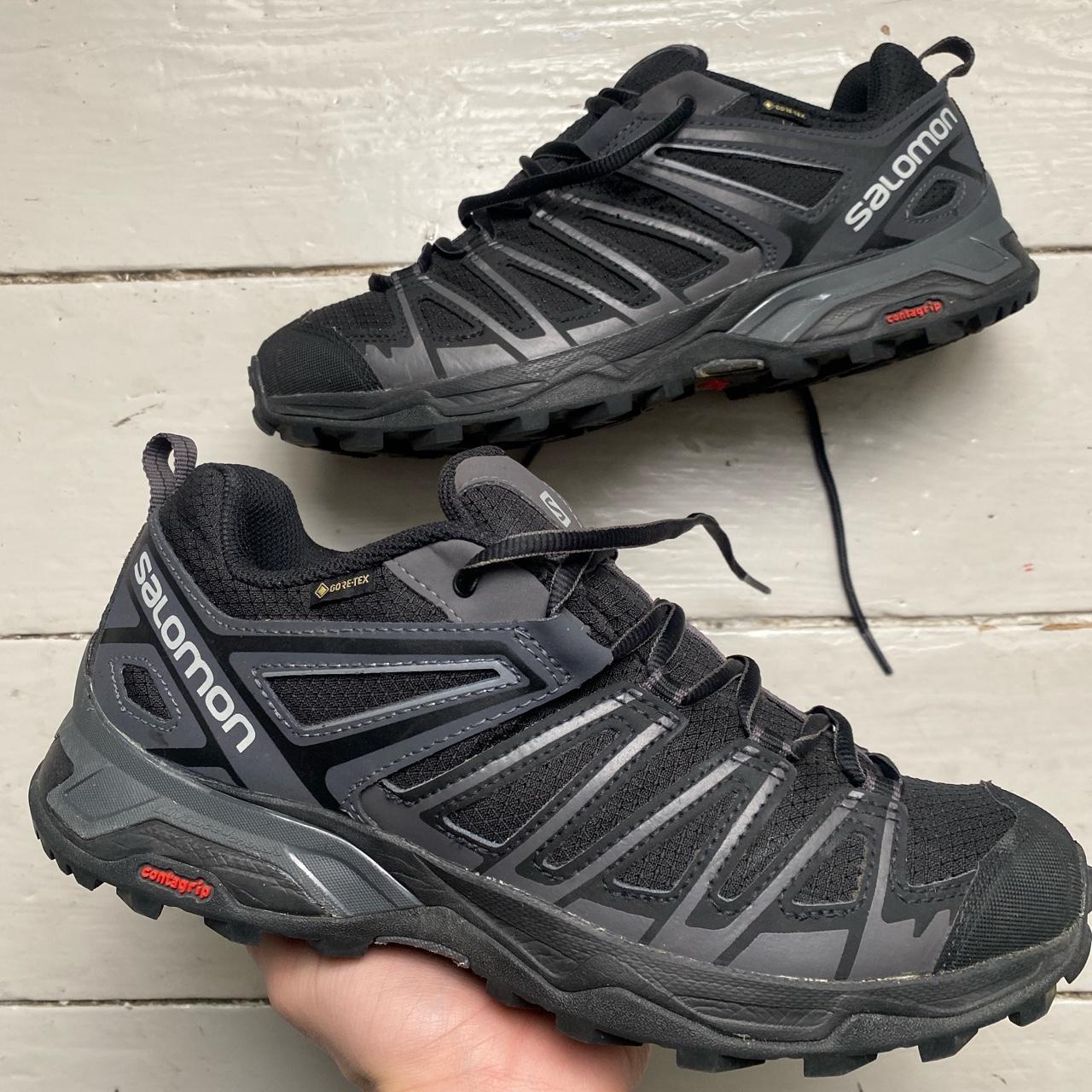 salomon black trainers
