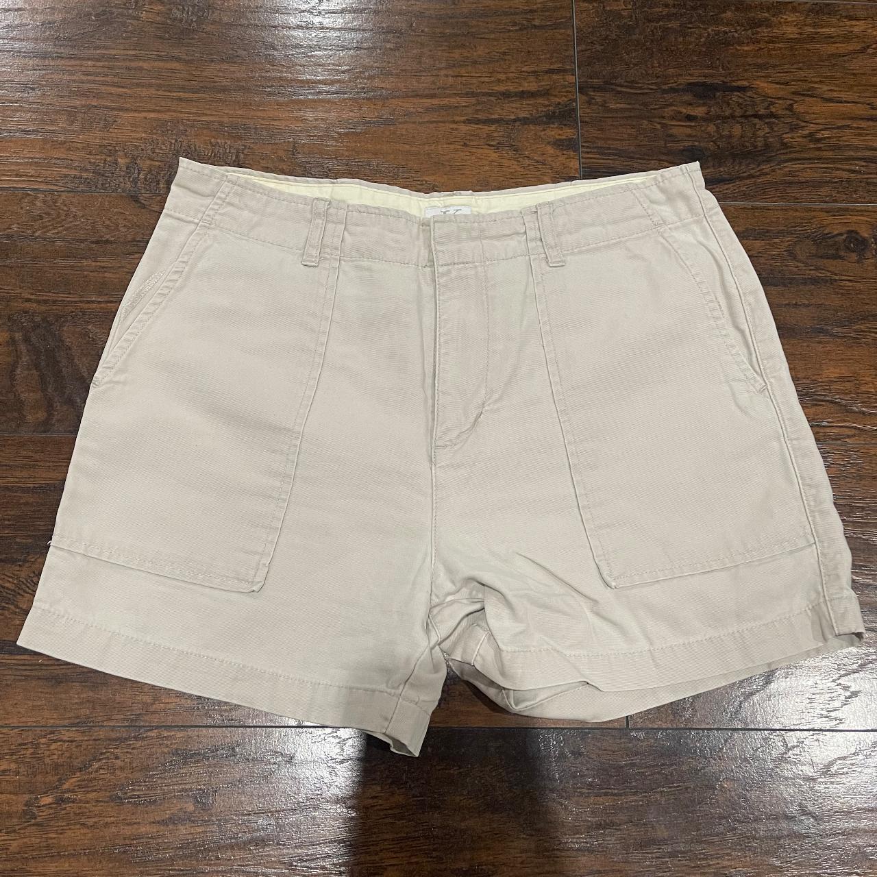 Calvin Klein Cream Shorts Would fit size 8/10... - Depop