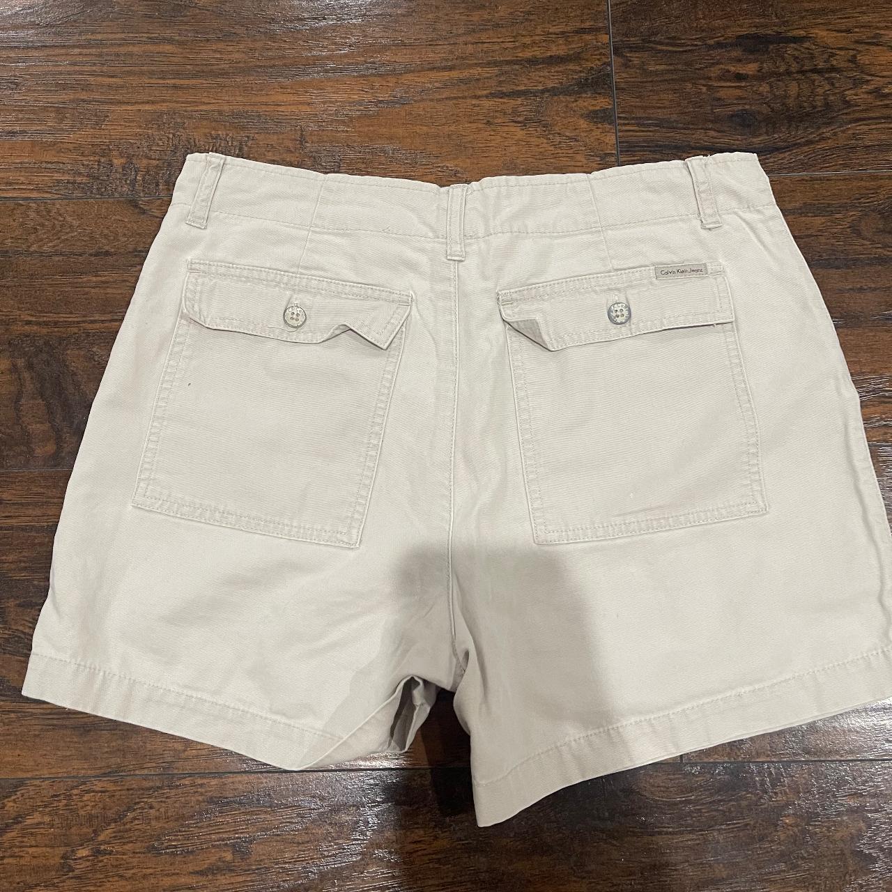 Calvin Klein Cream Shorts Would fit size 8/10... - Depop