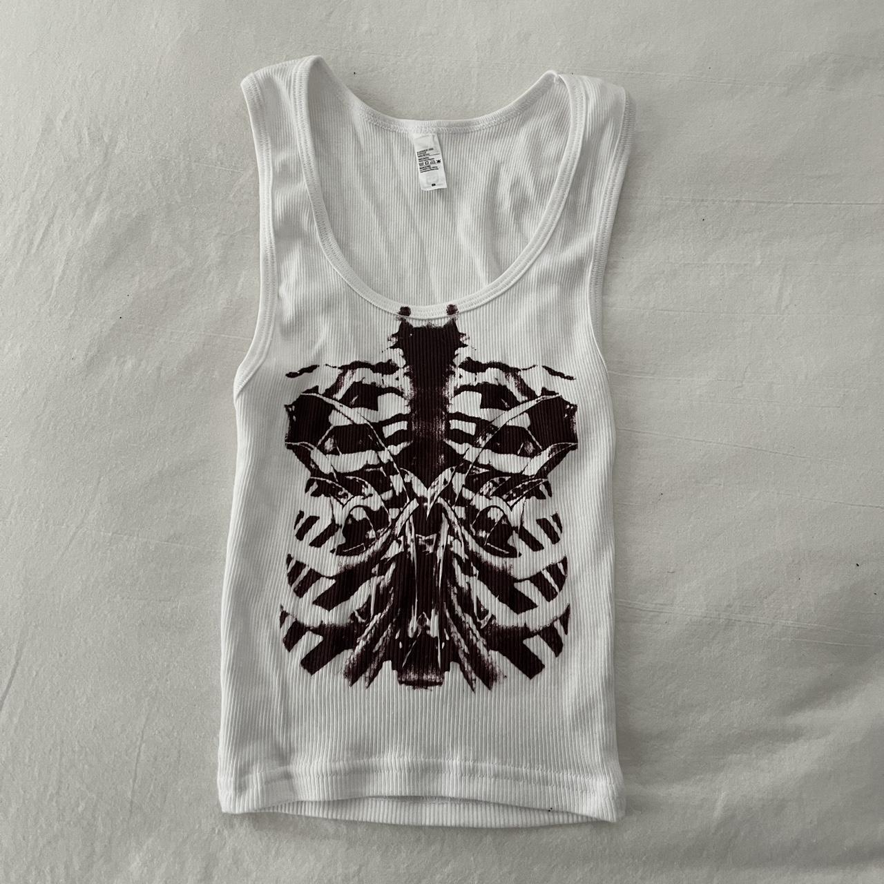 white ribbed tank with rib cage graphic brand gv... - Depop