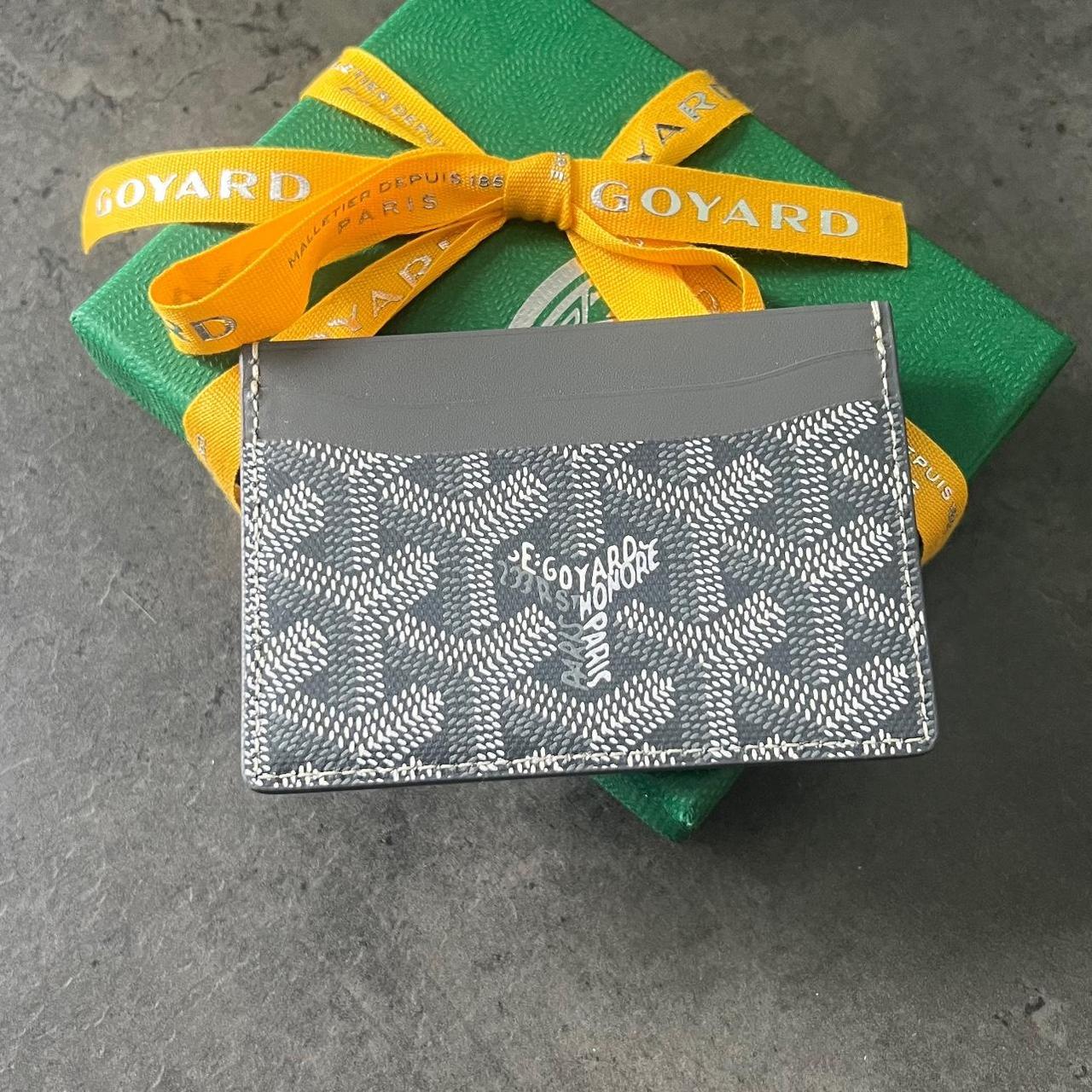 Goyard wallet hotsell fake