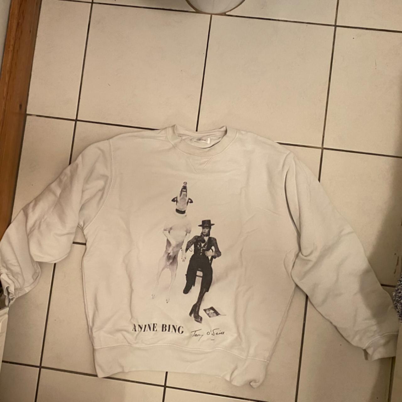 Size S white Anine Bing sweatshirt. Has David Bowie Depop