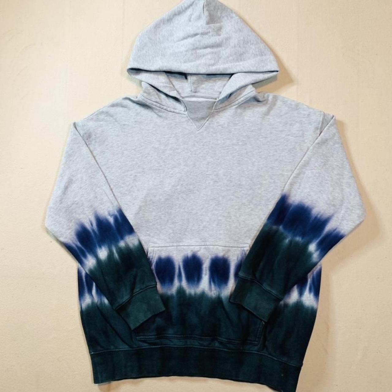black tie dye on grey shirt