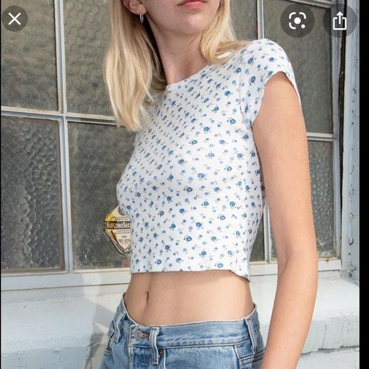 Blue floral Brandy Melville top💙🤍 it’s a really cute... Depop