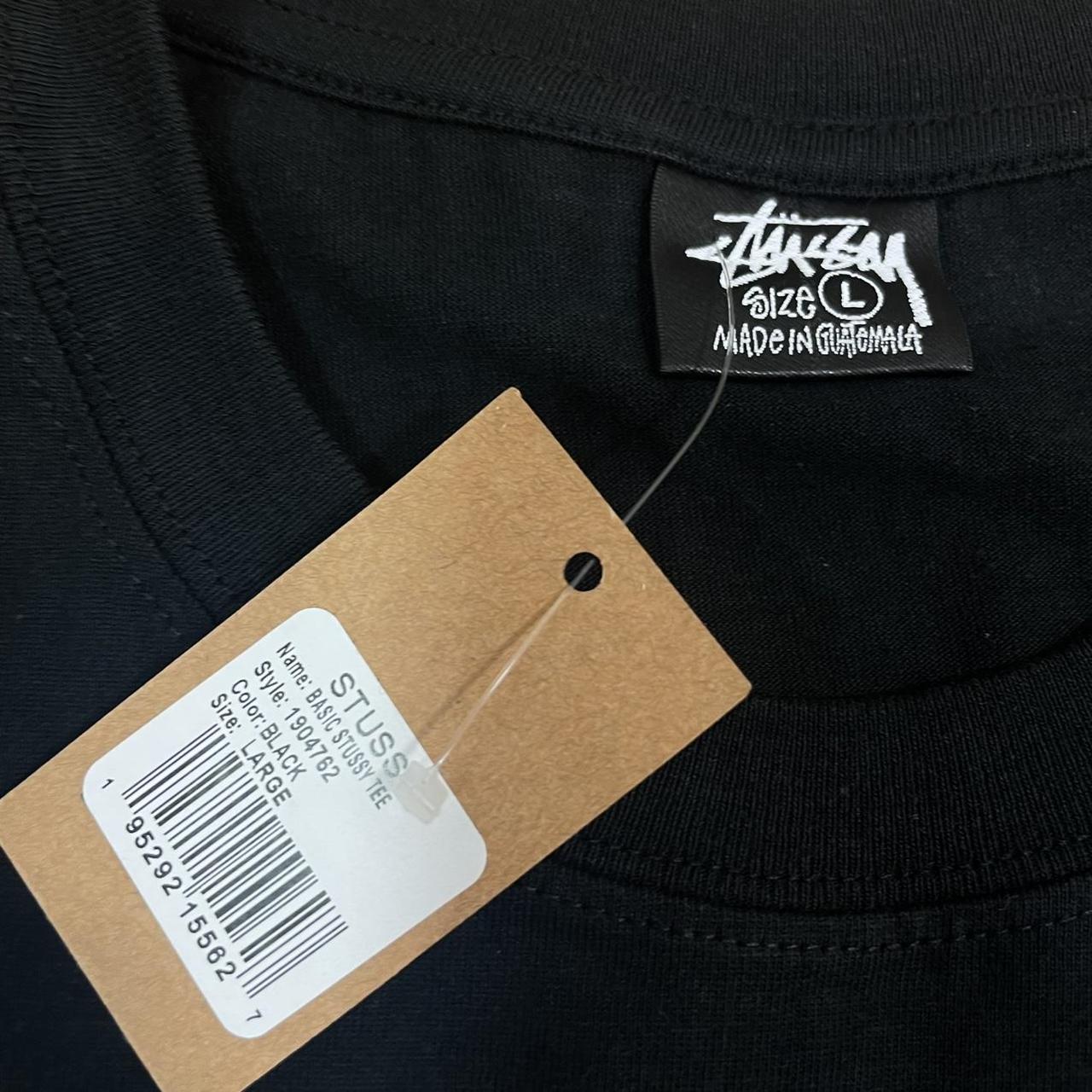 Stüssy Men's Black T-shirt | Depop