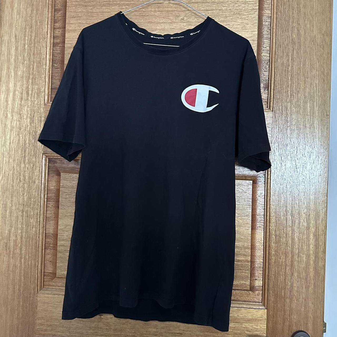 Champion, black t-shirt. In good condition, has some... - Depop