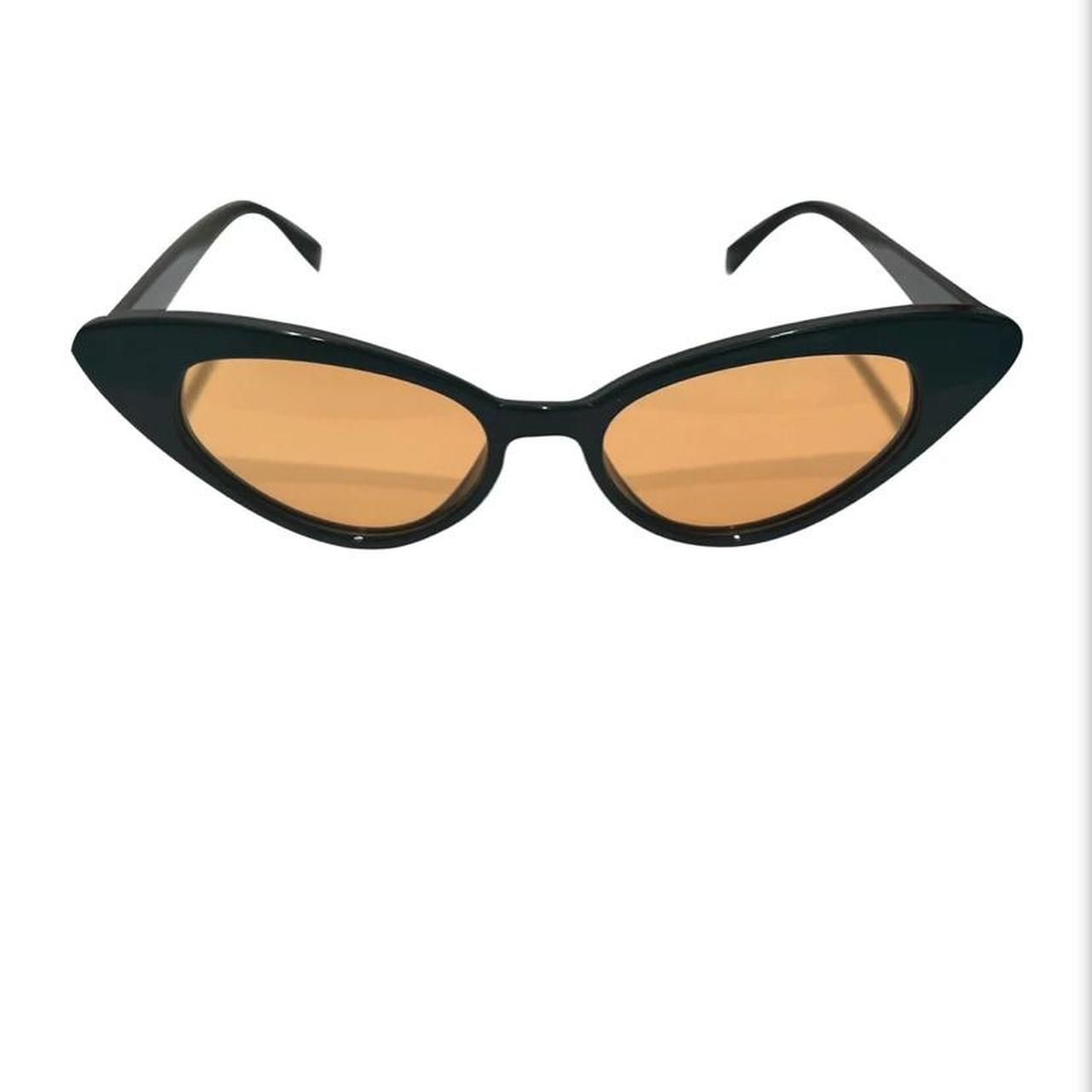 UNIF Women's Black and Gold Sunglasses Depop