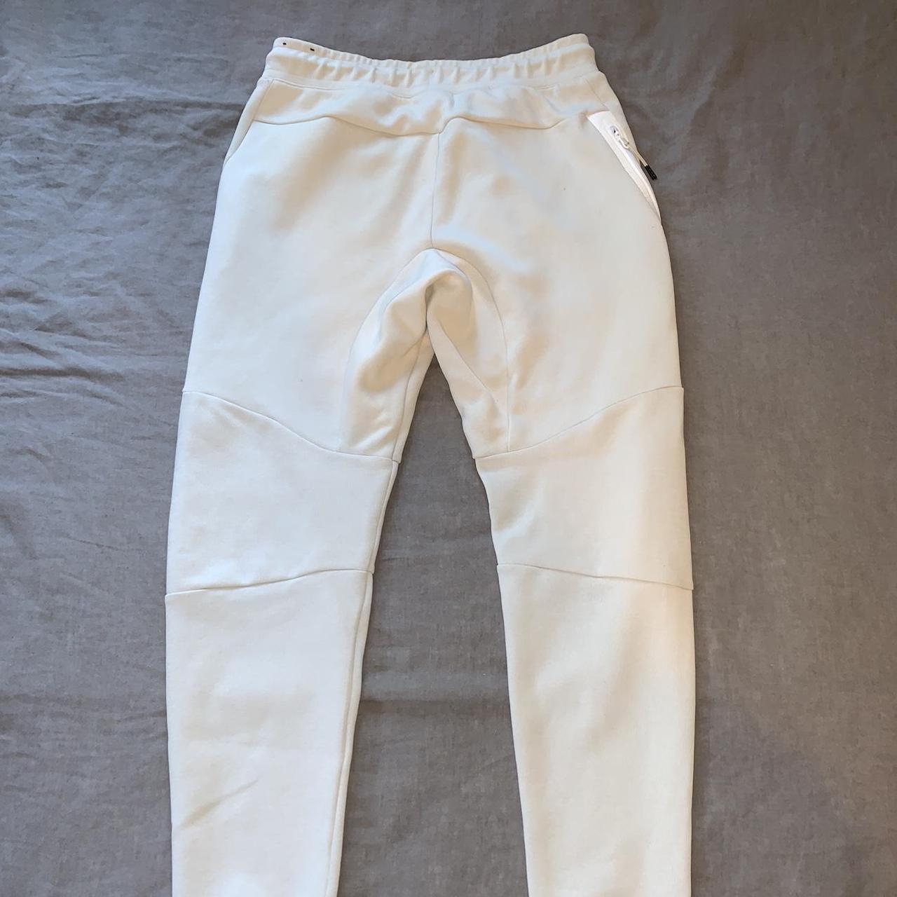 nike tech cream joggers