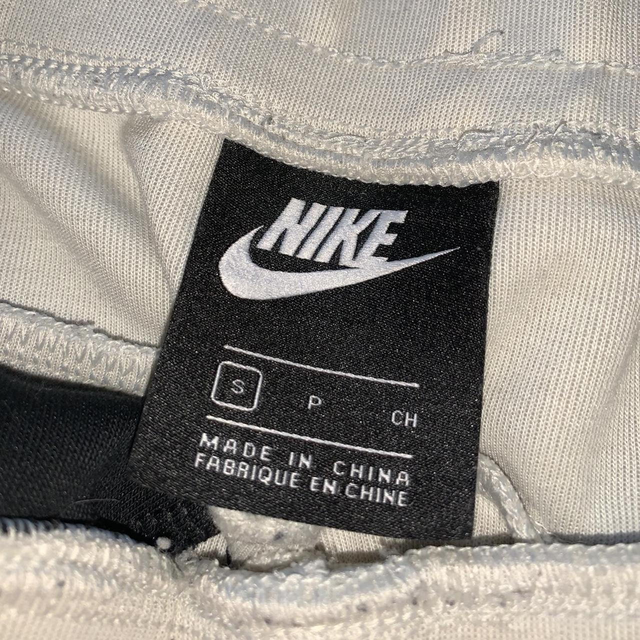 nike tech cream joggers