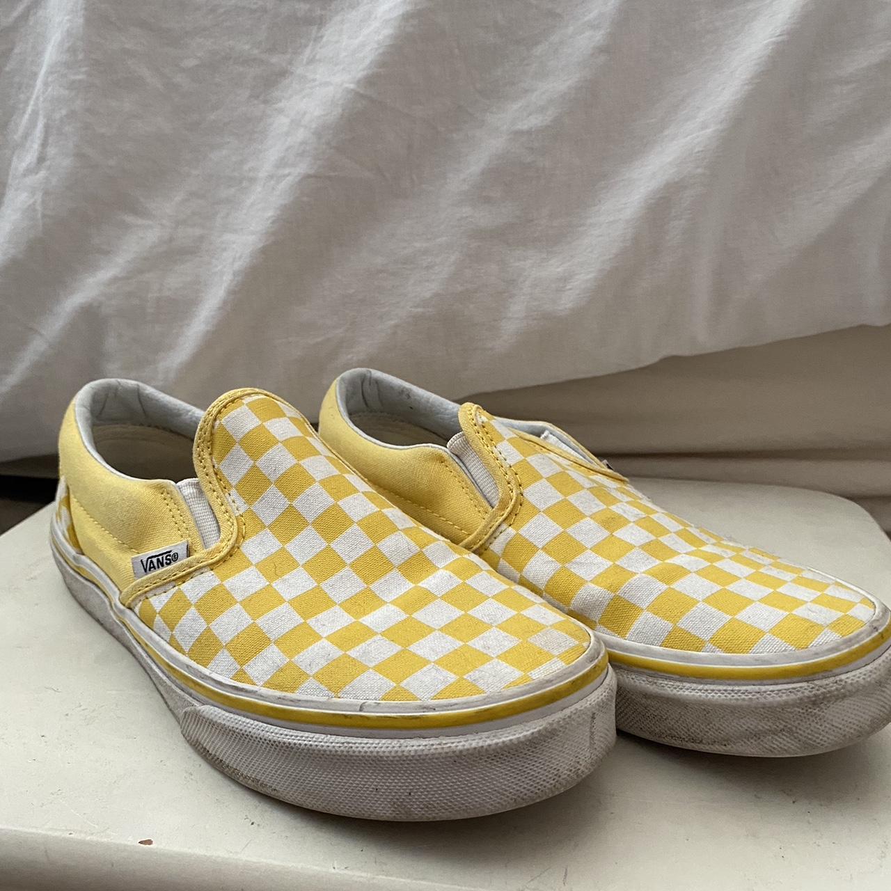 Vans yellow checkered slip hot sale ons