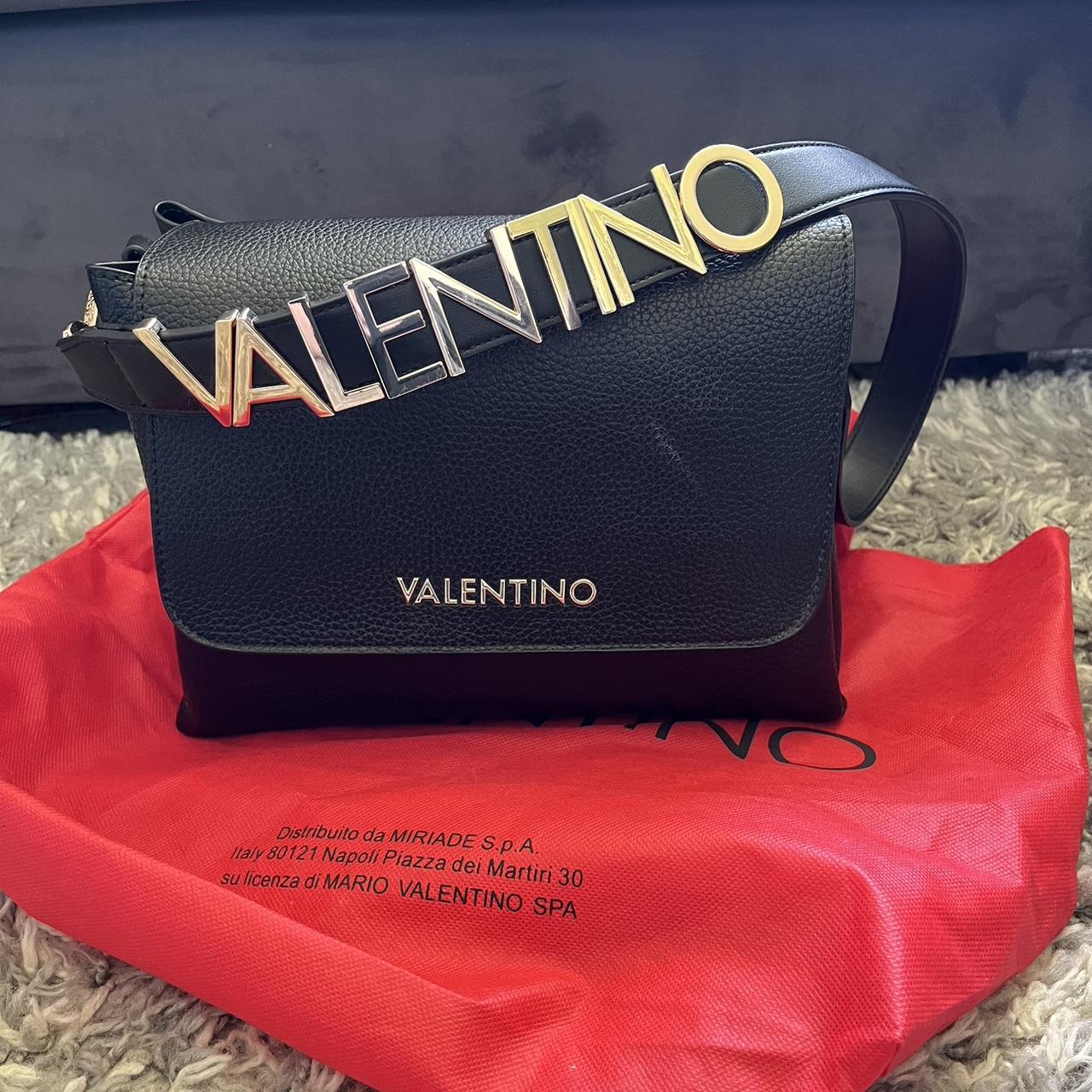 Valentino bag With red dust bag Paid £115 Open on... Depop
