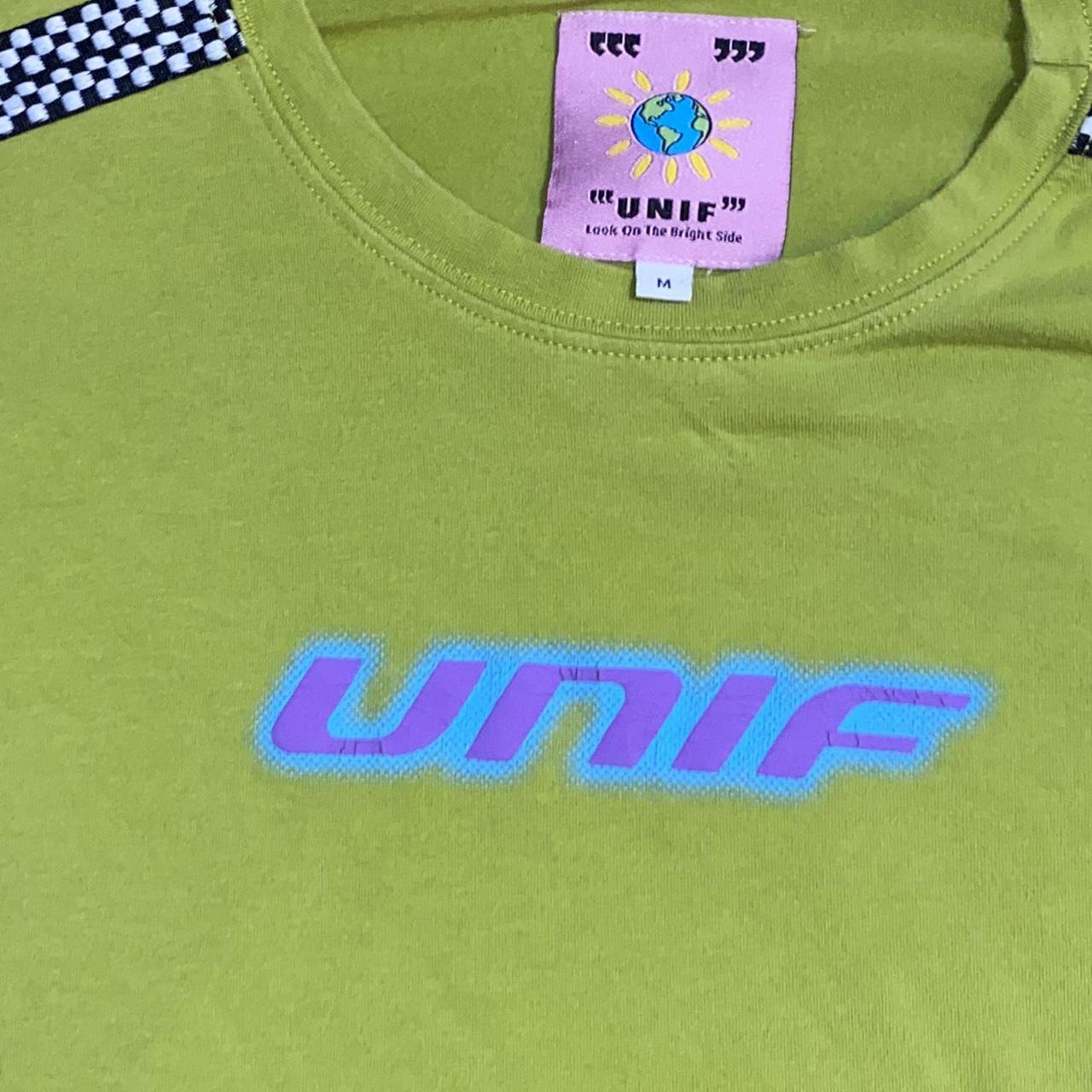 UNIF crop top, slight crack on logo, otherwise... Depop