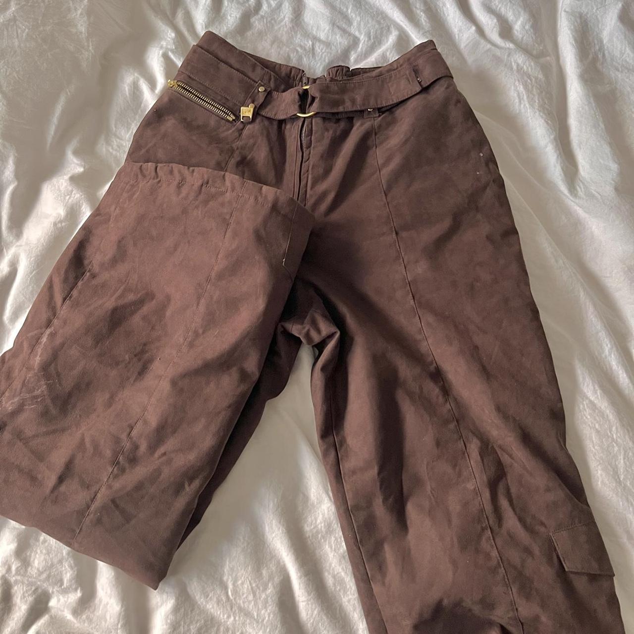 Brown suede ski snow pants with gold accents.... Depop