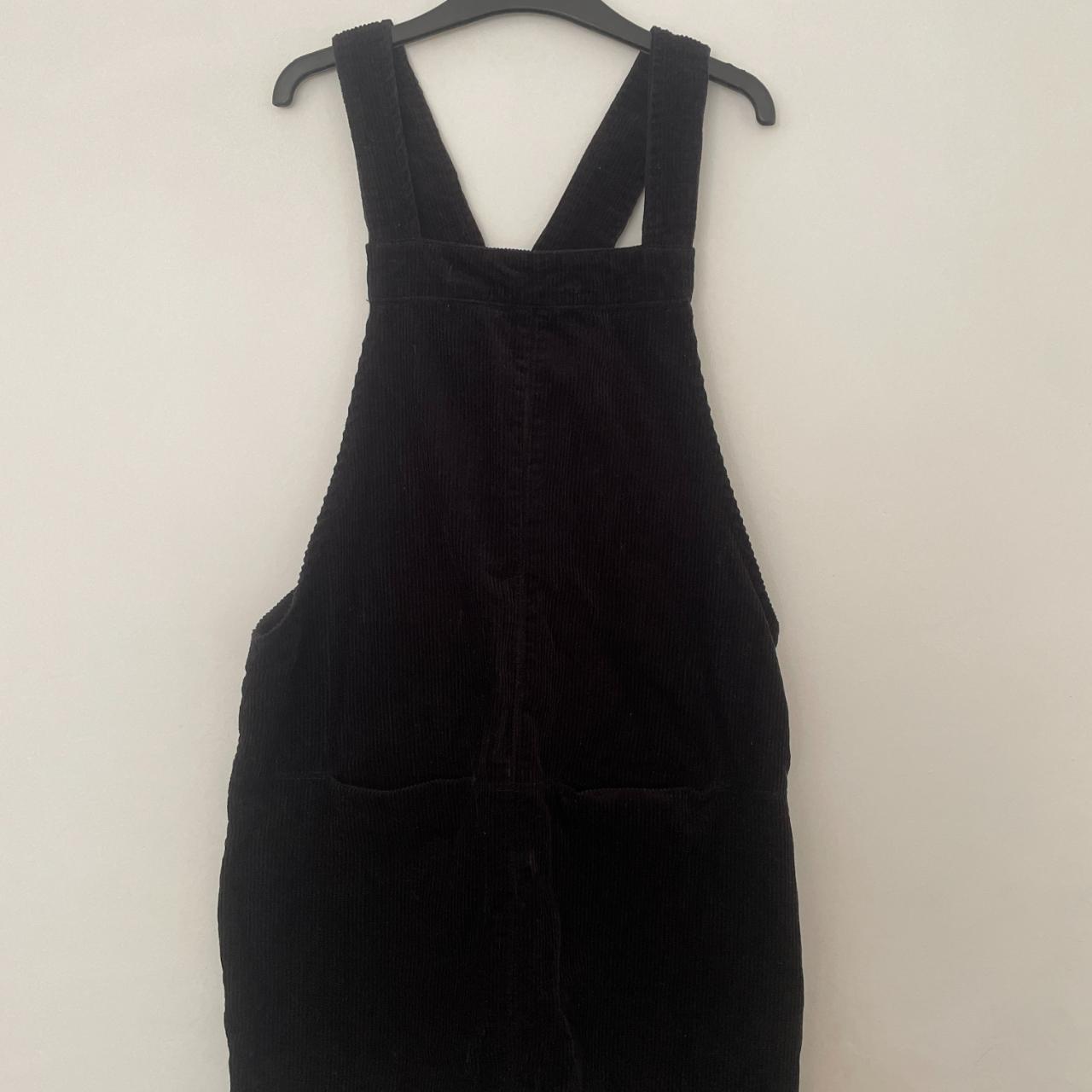 Black Corduroy Pinafore Dress. Goes down to about. Depop