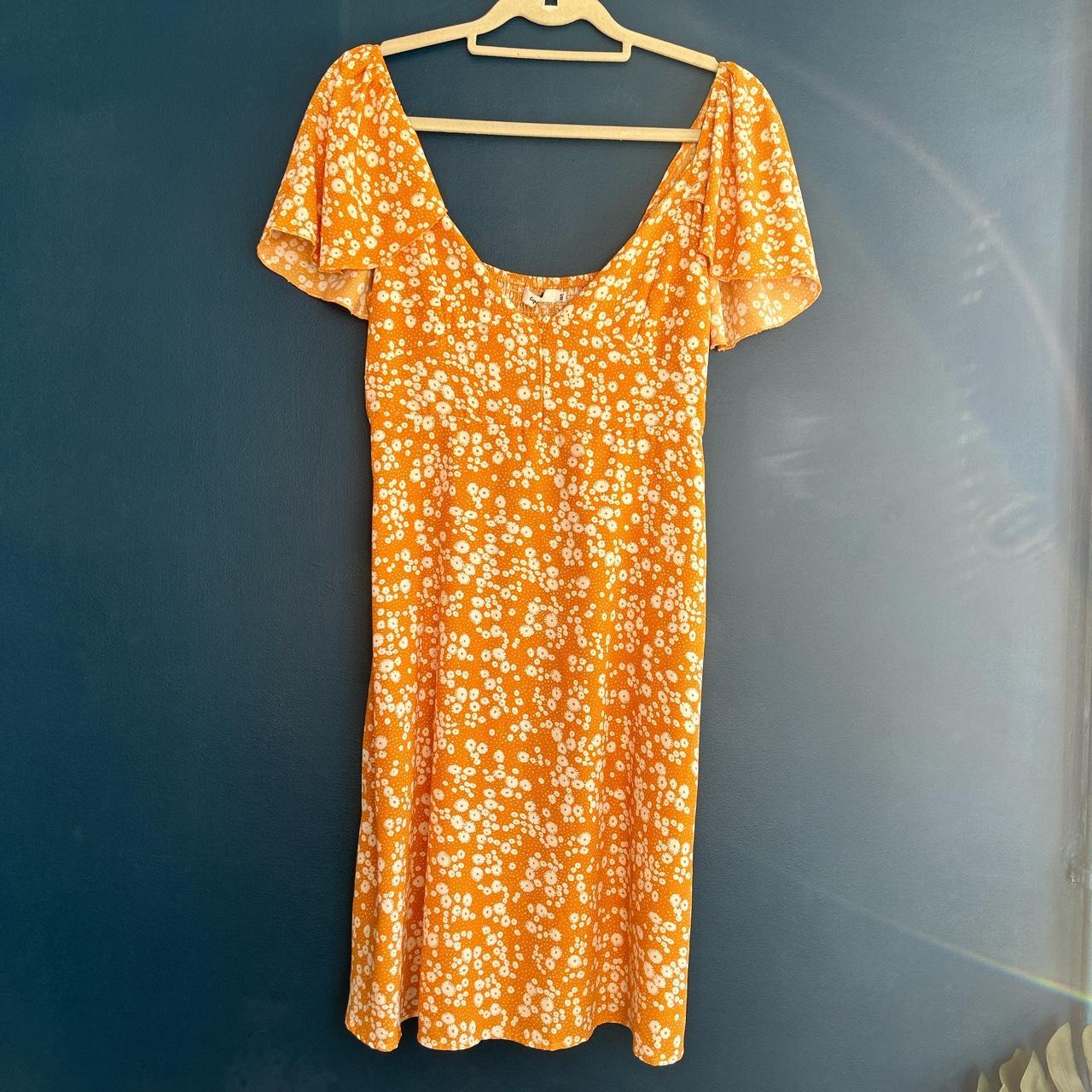 Super cute orange floral summer dress, size M/L.... Depop