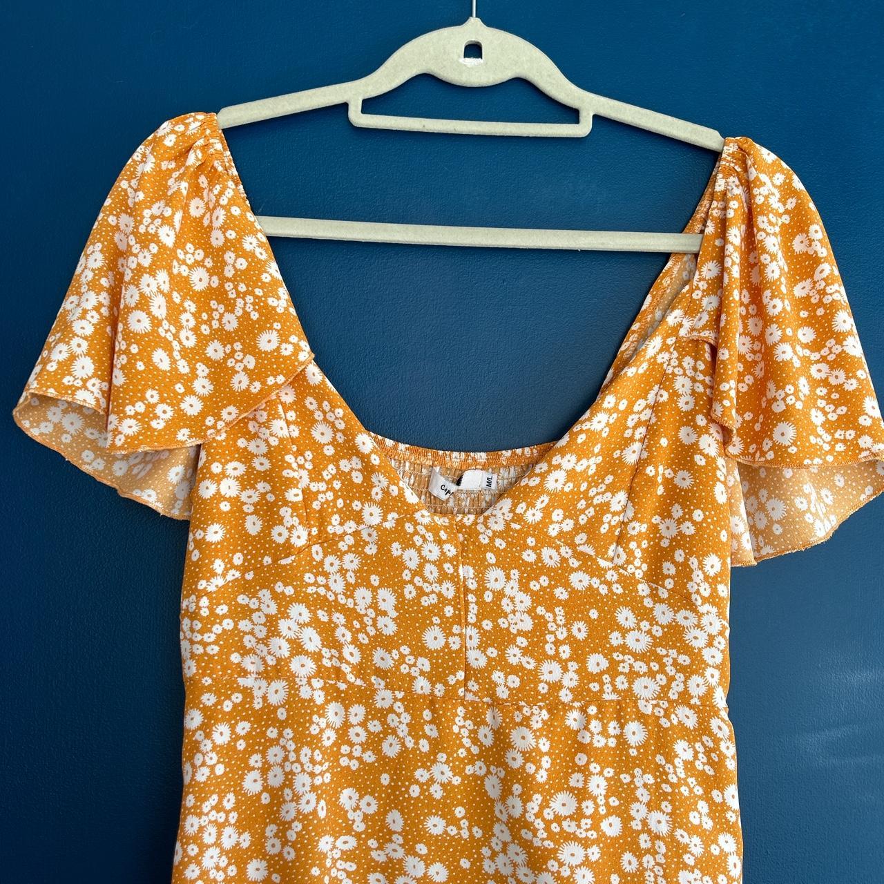 Super cute orange floral summer dress, size M/L.... Depop