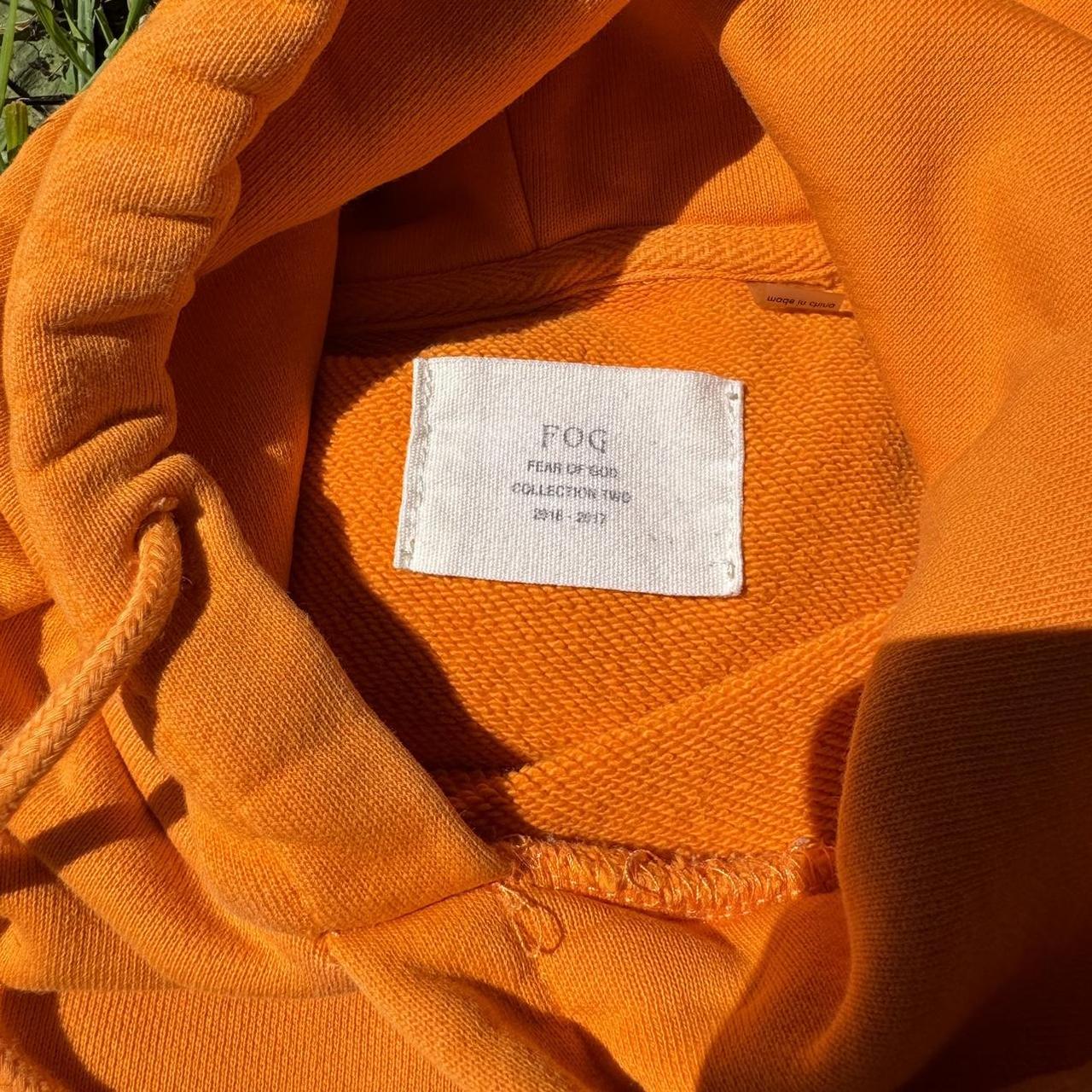 Fear of god orange hoodie best sale