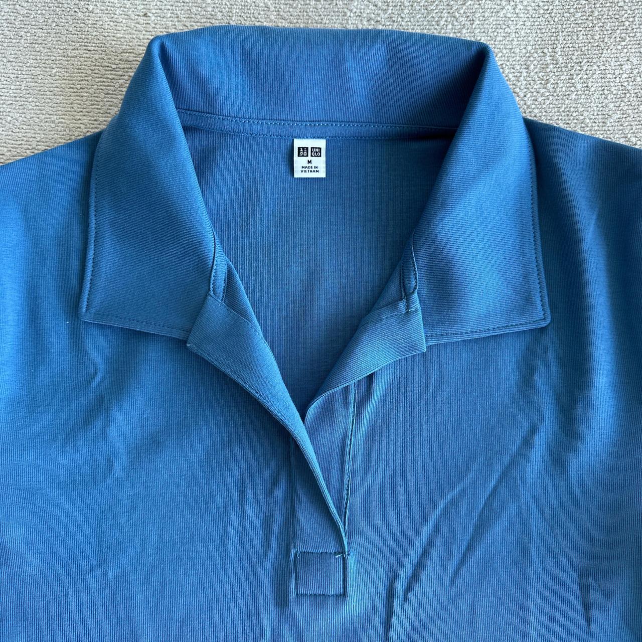Blue cropped collared t-shirt from Uniqlo. Never | Depop