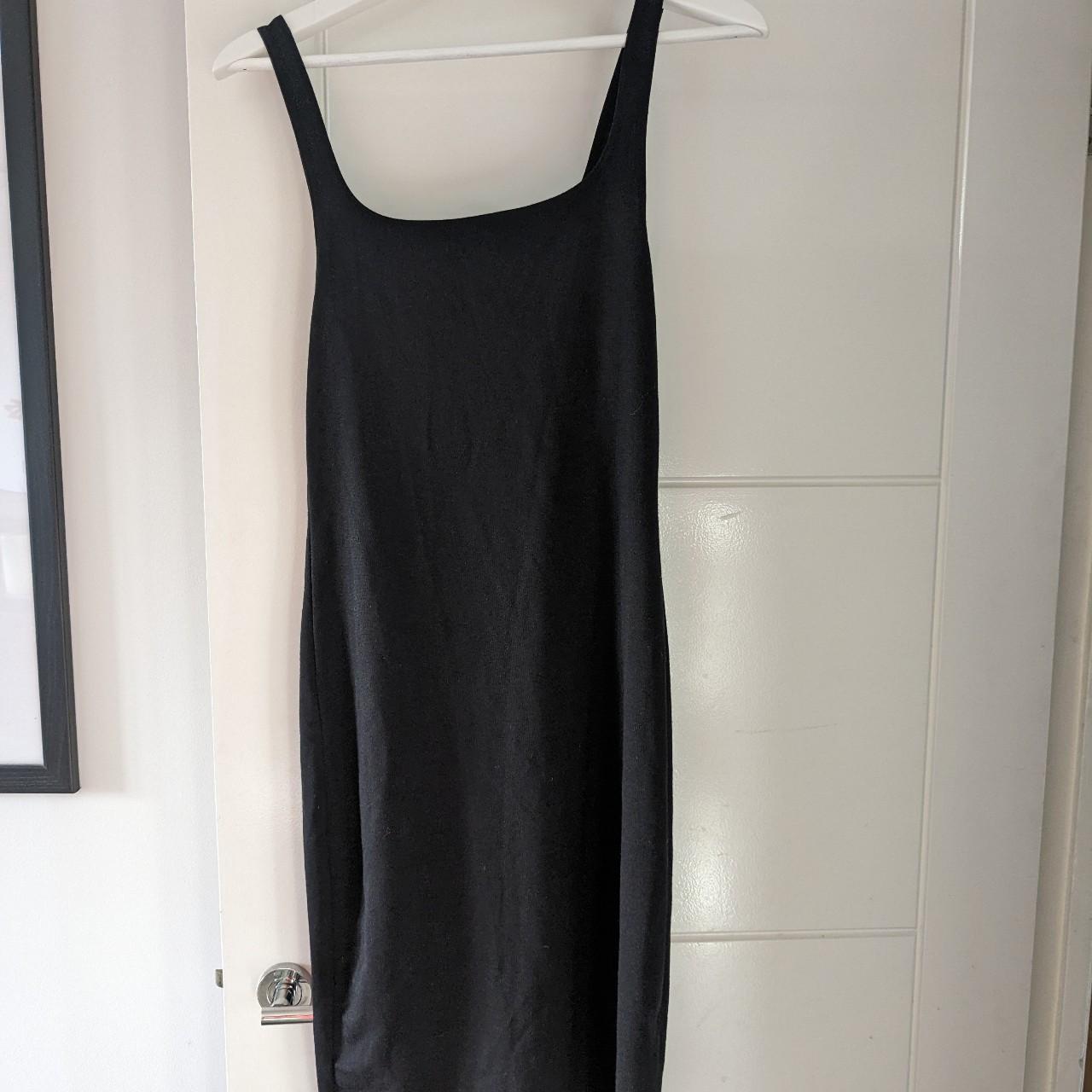 Black skin tight midi dress from Zara, it's a size L... - Depop