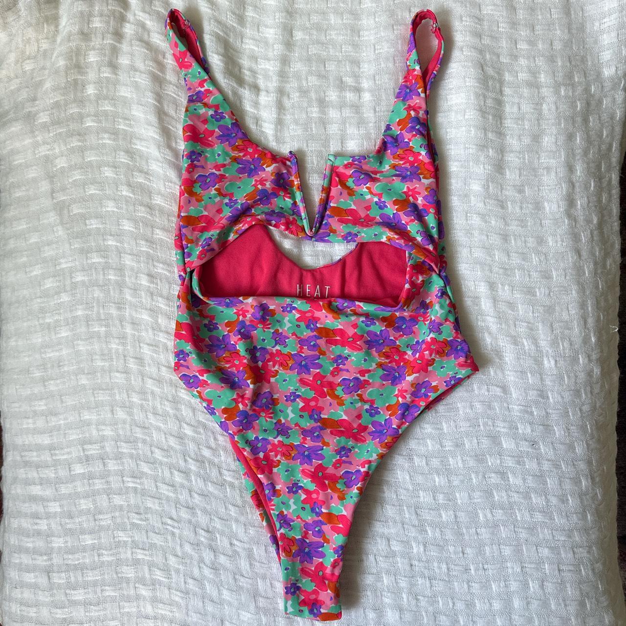 women’s one piece cut out swimsuit. does have a low... - Depop