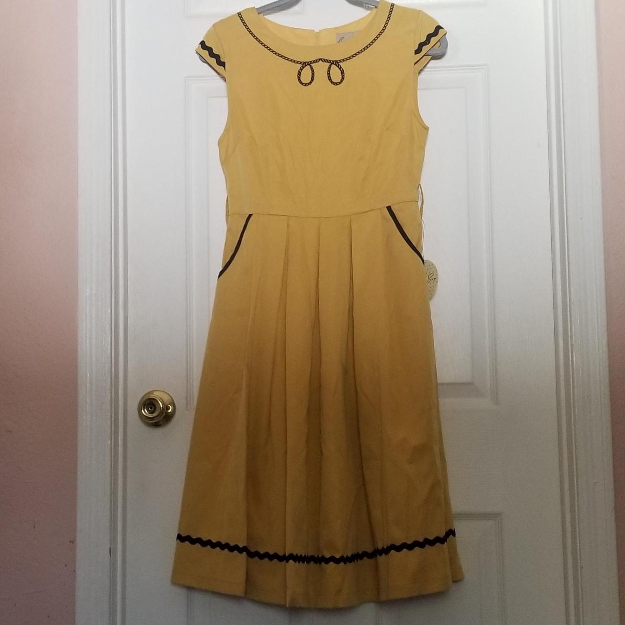 LINDY BOP dress is new w tag size US 4 UK 8. Has