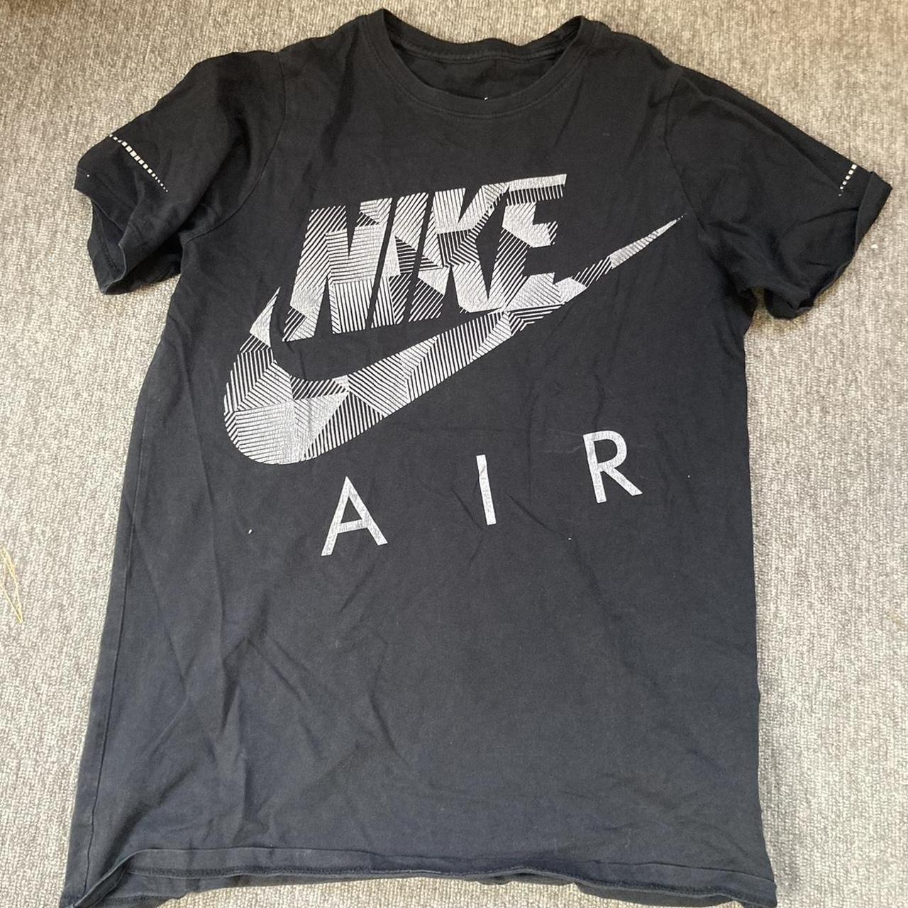 Black Nike t shirt . Says size xl but fits like s/m... - Depop