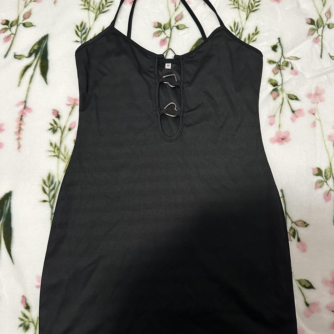 Black mini dress with middle cut out and heart