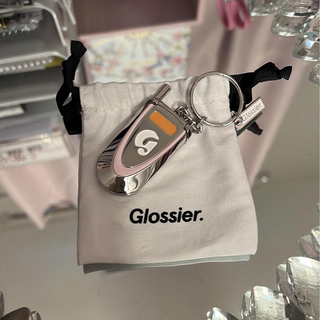 Glossier LA Exclusive Key Chain will come with dust... Depop