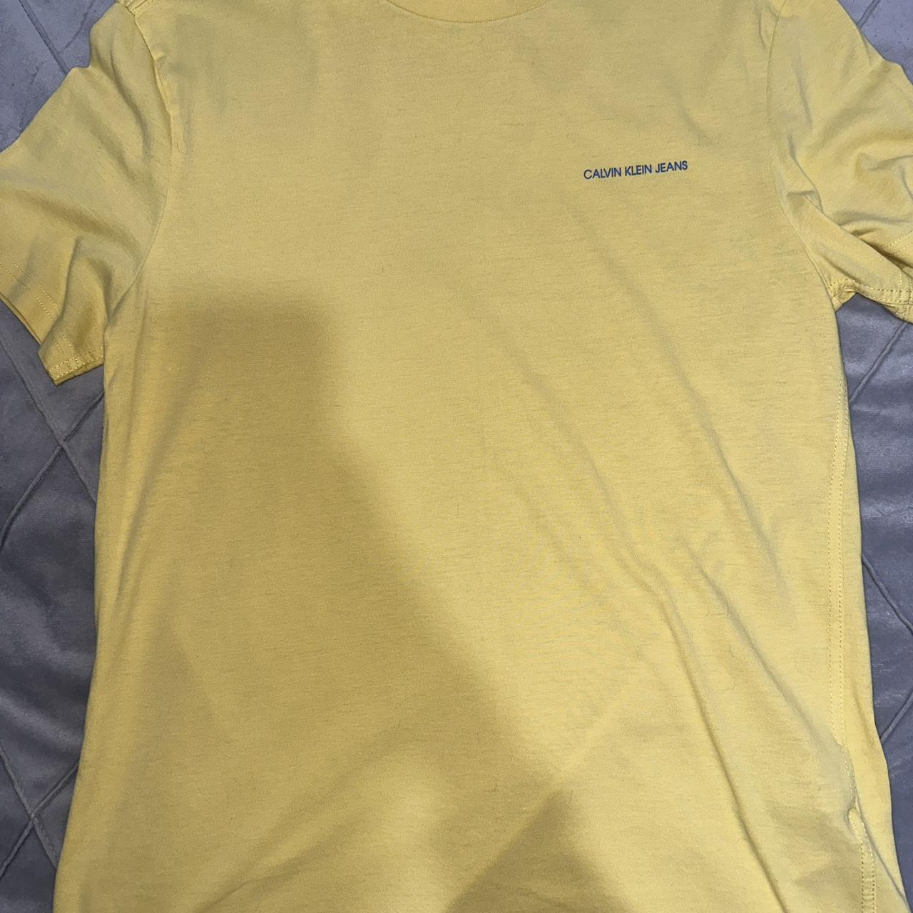 Calivn Klein tshirt Bright yellow Worn twice Size... - Depop