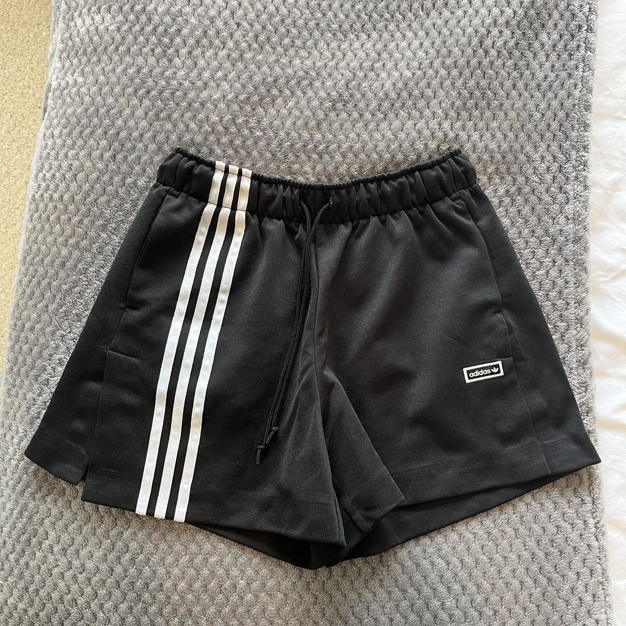 Adidas Black Shorts with side slits Worn a couple of... - Depop