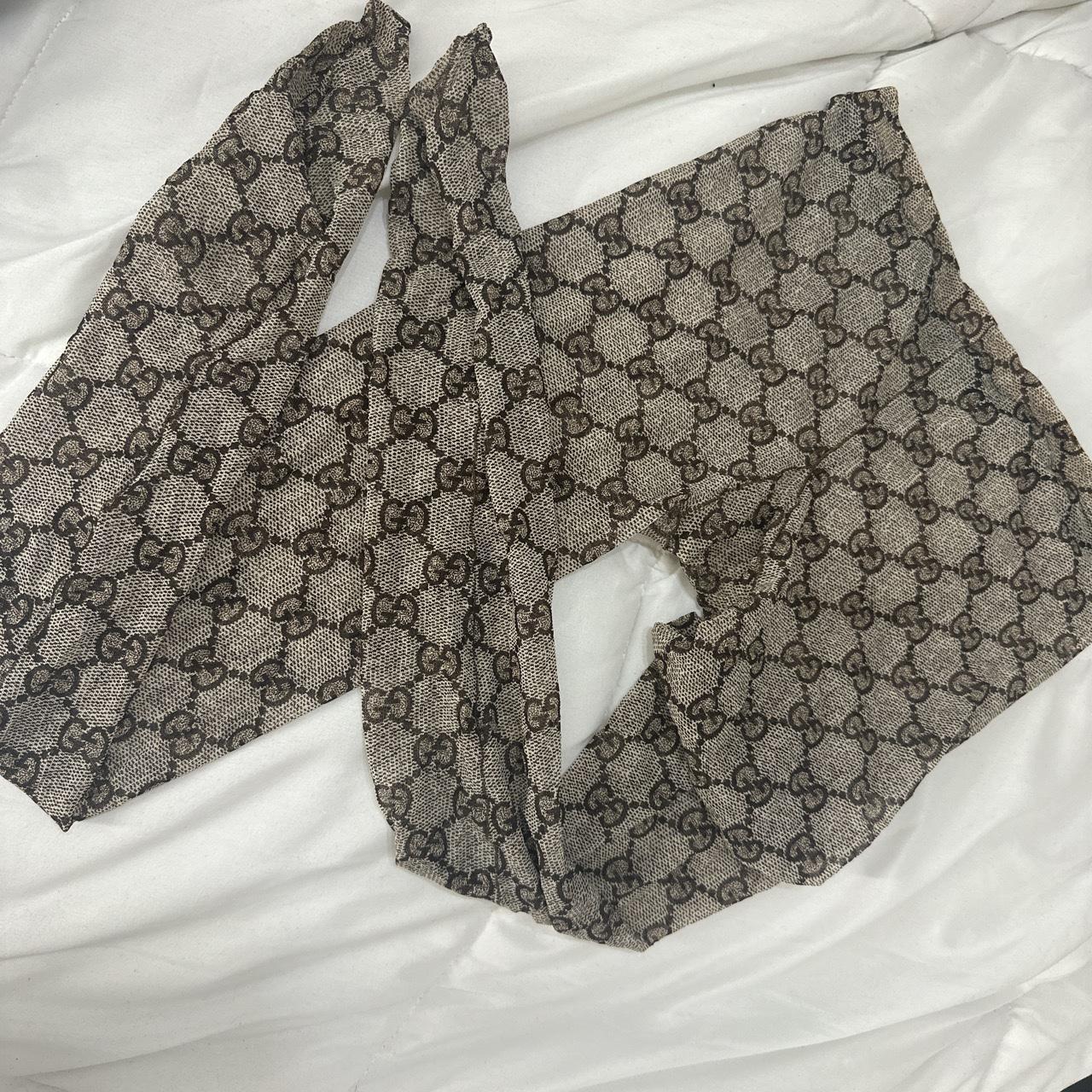 Gucci GG Supreme leggings in Brown