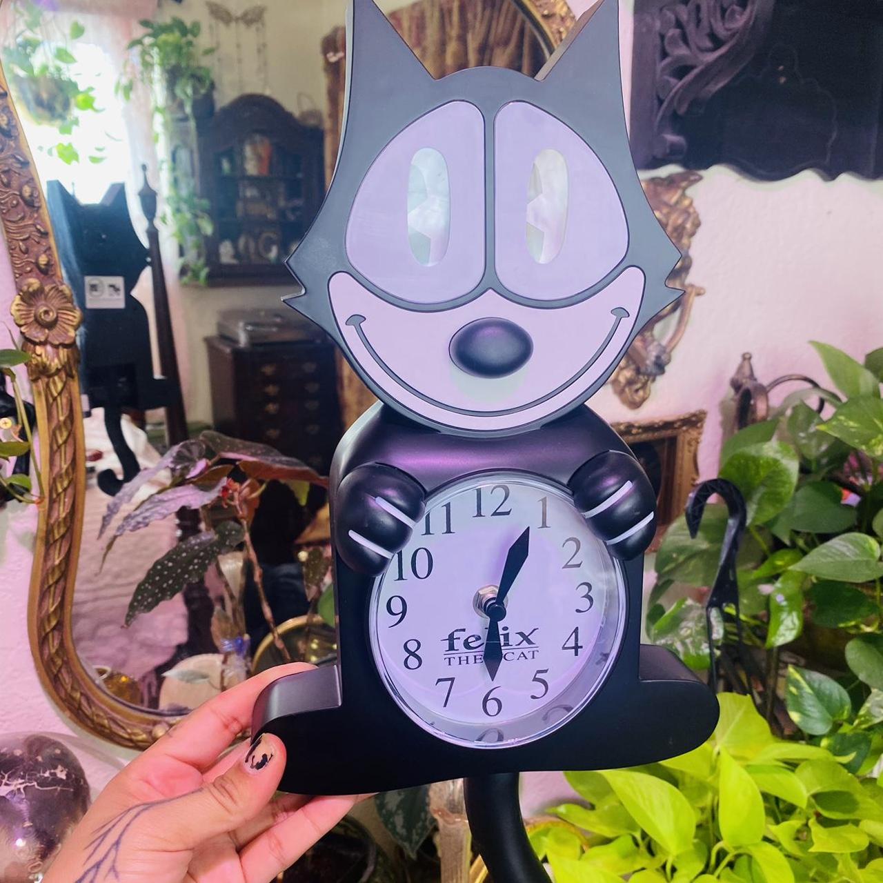 Kitty cat clock with swinging tail Depop