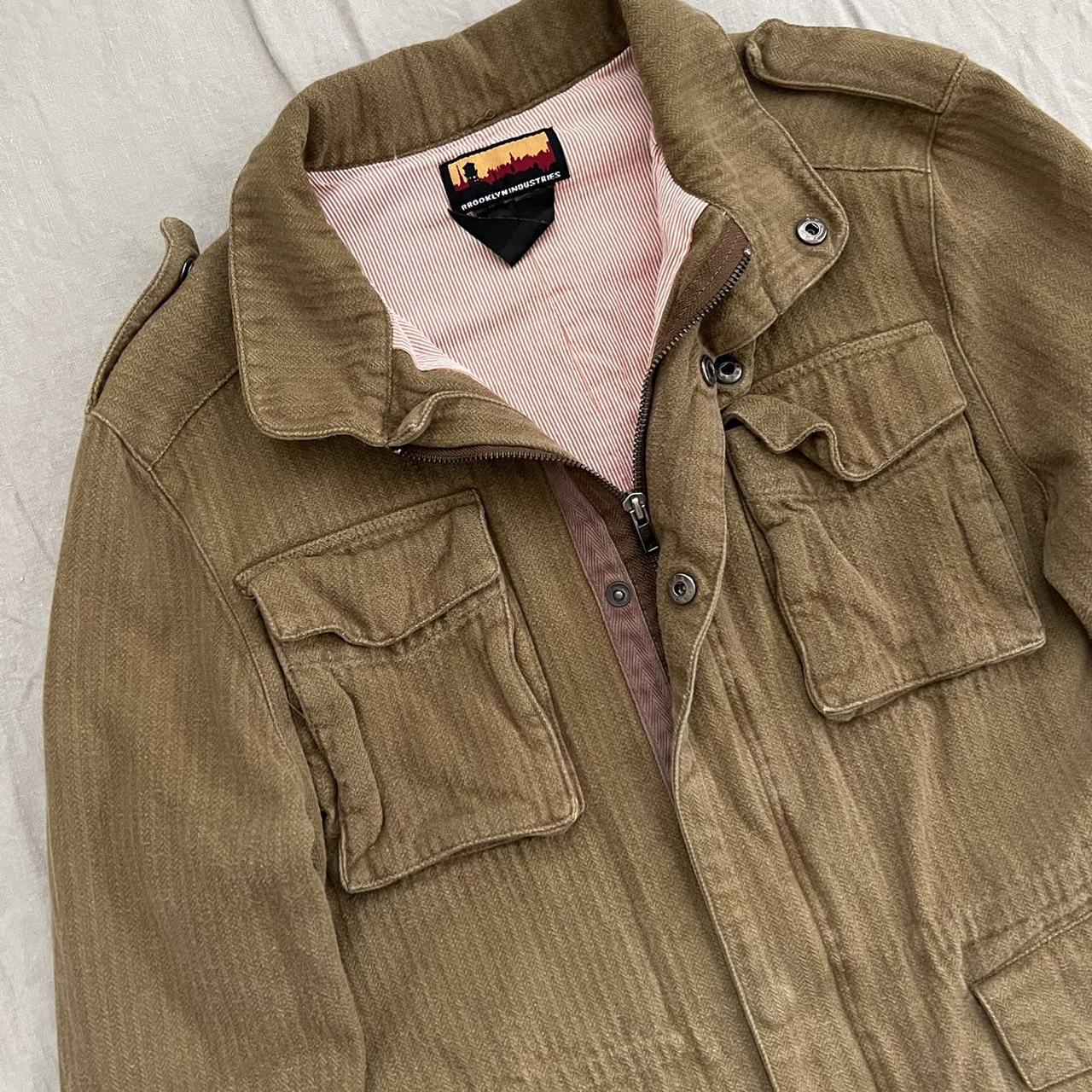 Khaki colored cargo coat. Had concealed draw string... - Depop