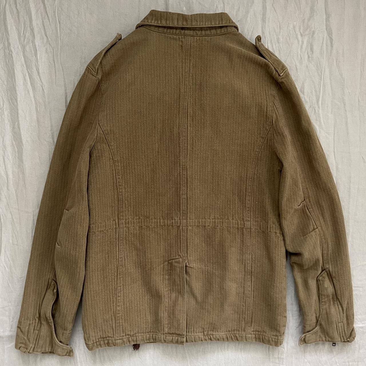 Khaki colored cargo coat. Had concealed draw string... - Depop