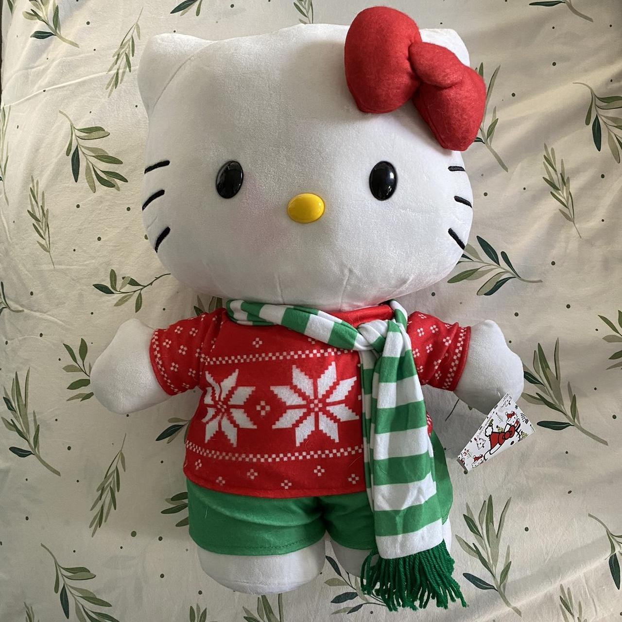 Hello kitty christmas greeter she has a red mark depop